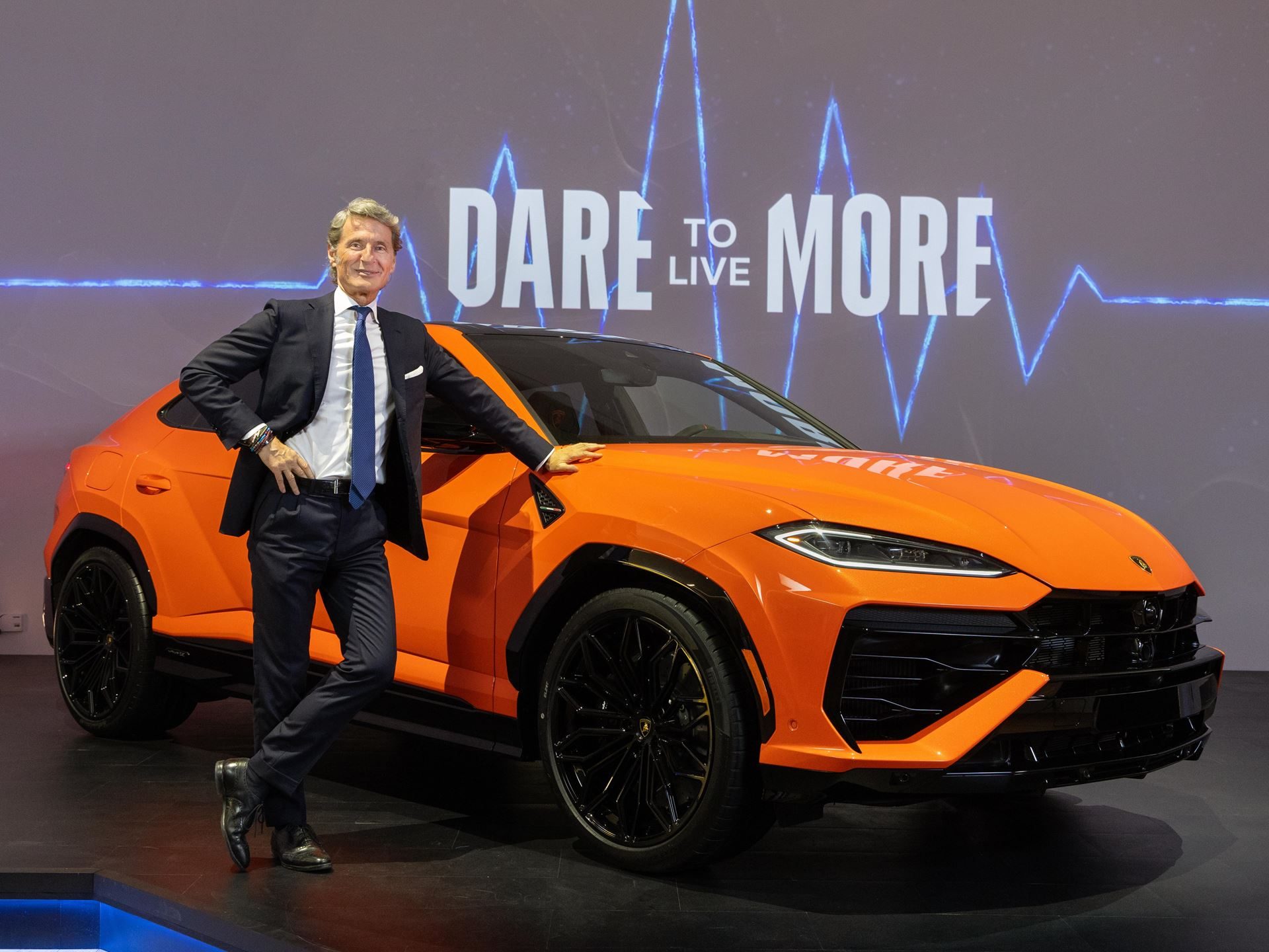 Lamborghini Brings The 789-Hp Urus Se To New York, Betting Its Best-Seller On Hybrid Power 3 Stephan winkelmann, ceo of automobili lamborghini, poses next to the orange urus se at the us premiere event