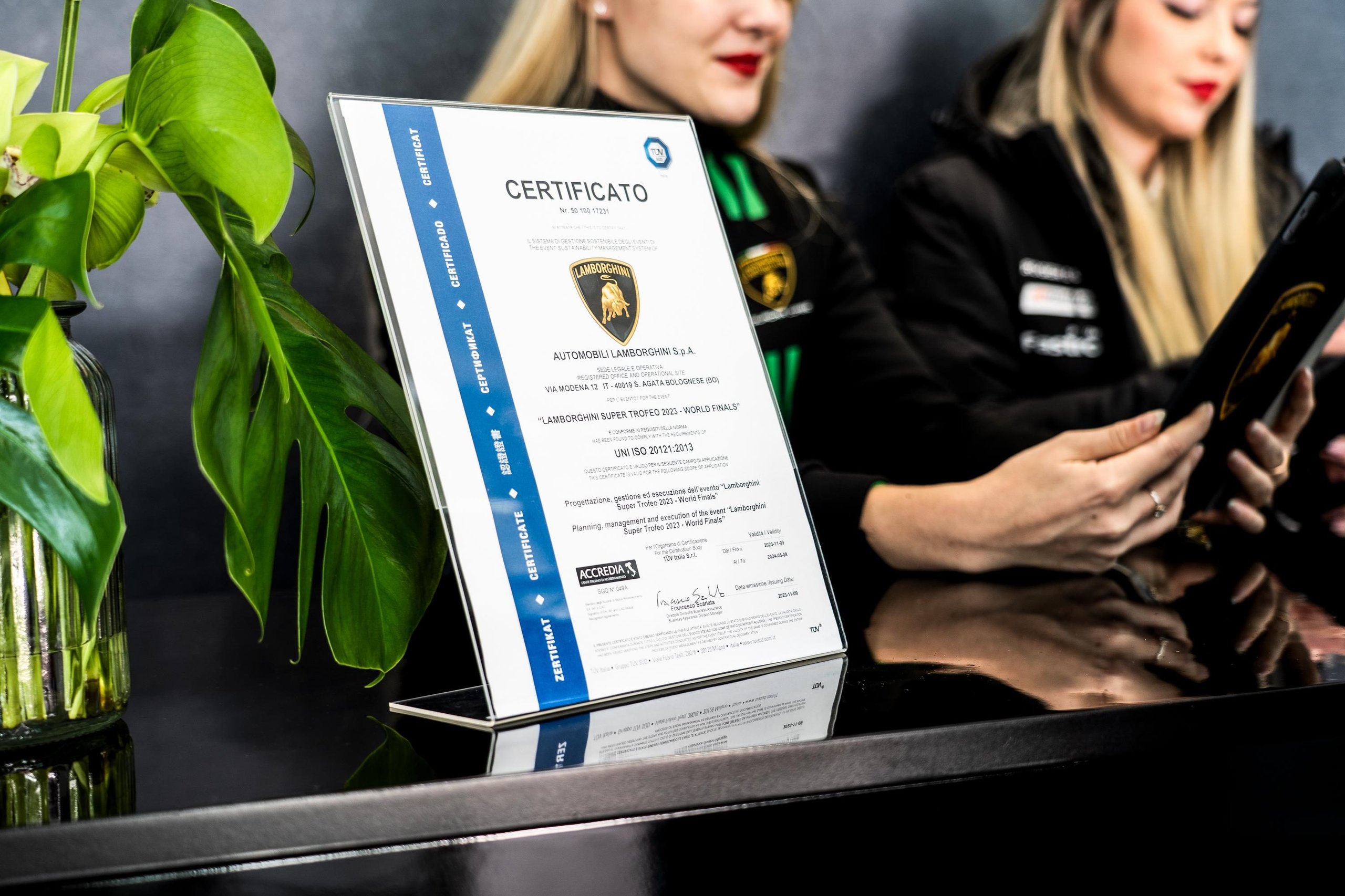 Lamborghini'S World Finals Earned A Sustainability Certification Most Motorsport Events Don'T Bother Pursuing 3 Close-up of the iso 20121 certification document for automobili lamborghini s. P. A. Displayed on a stand