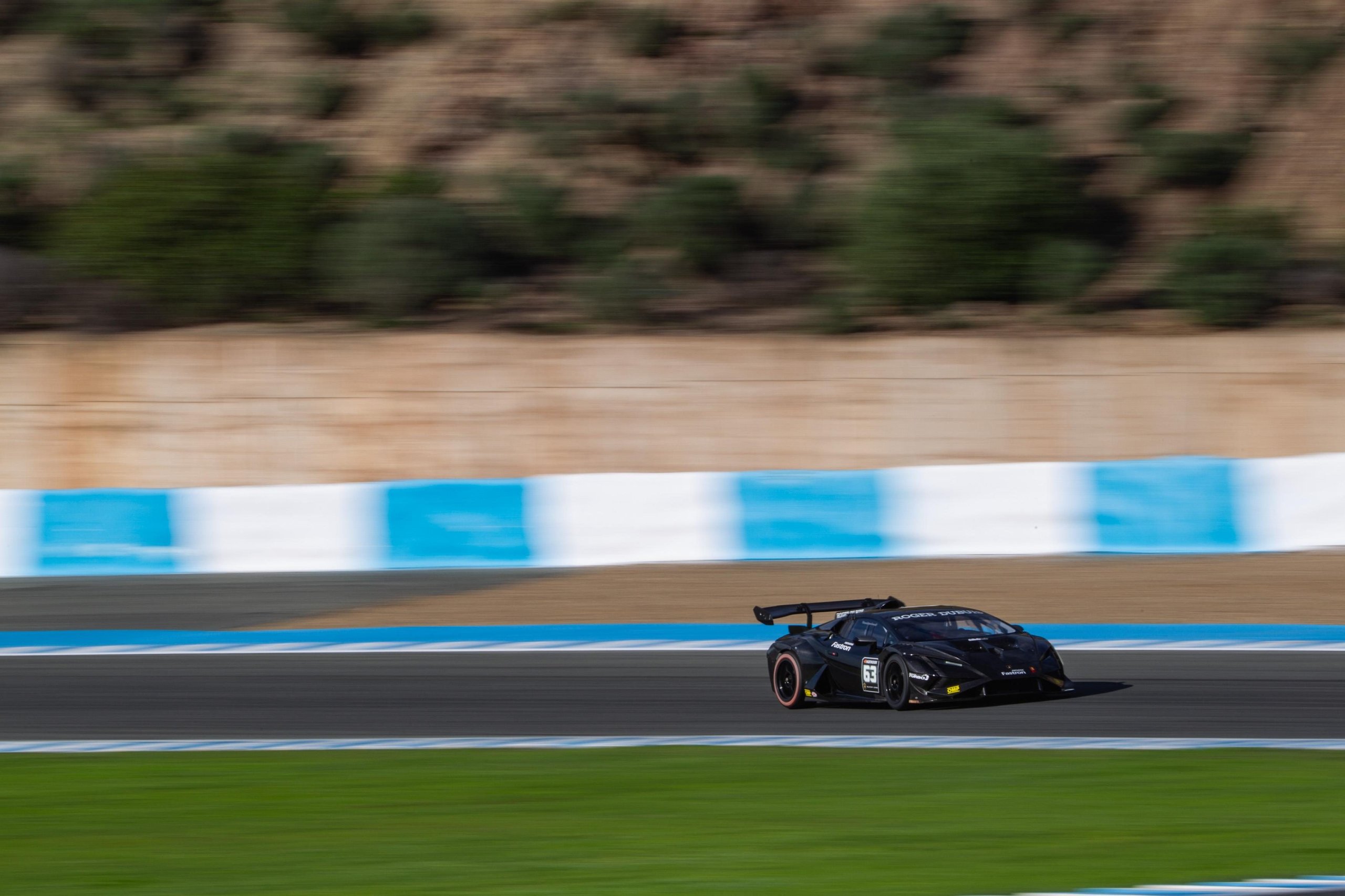 Squadra Corse Rewrites Its Talent Playbook: 26 Drivers Enter Lamborghini'S Merit-Based Pipeline For 2025 7 Black lamborghini huracán gt3 evo2 racing at speed on a circuit with motion blur