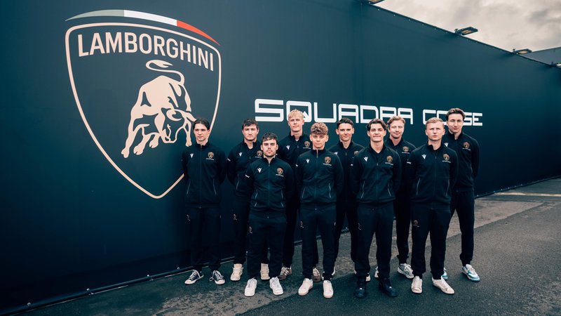 2025 Lamborghini Young Driver Program intake standing in front of Squadra Corse branding