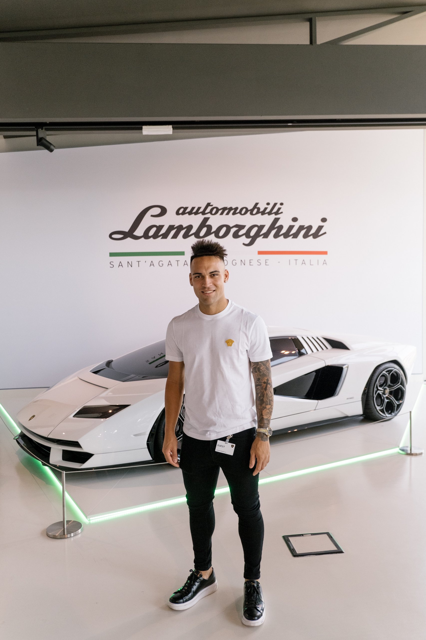 Inside Lautaro Martinez'S Bespoke Urus Configuration At Lamborghini'S Sant'Agata Factory 7 Lautaro martinez in the lamborghini showroom with a white countach lpi 800-4 and the automobili lamborghini sant'agata bolognese logo on the wall
