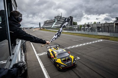 Brendon Leitch'S Late-Race Dummy Move At Nürburgring Delivers Leipert Motorsport'S First Overall Super Trofeo Win 2 Lamborghini huracán super trofeo evo2 crossing the finish line at nürburgring with checkered flag waving