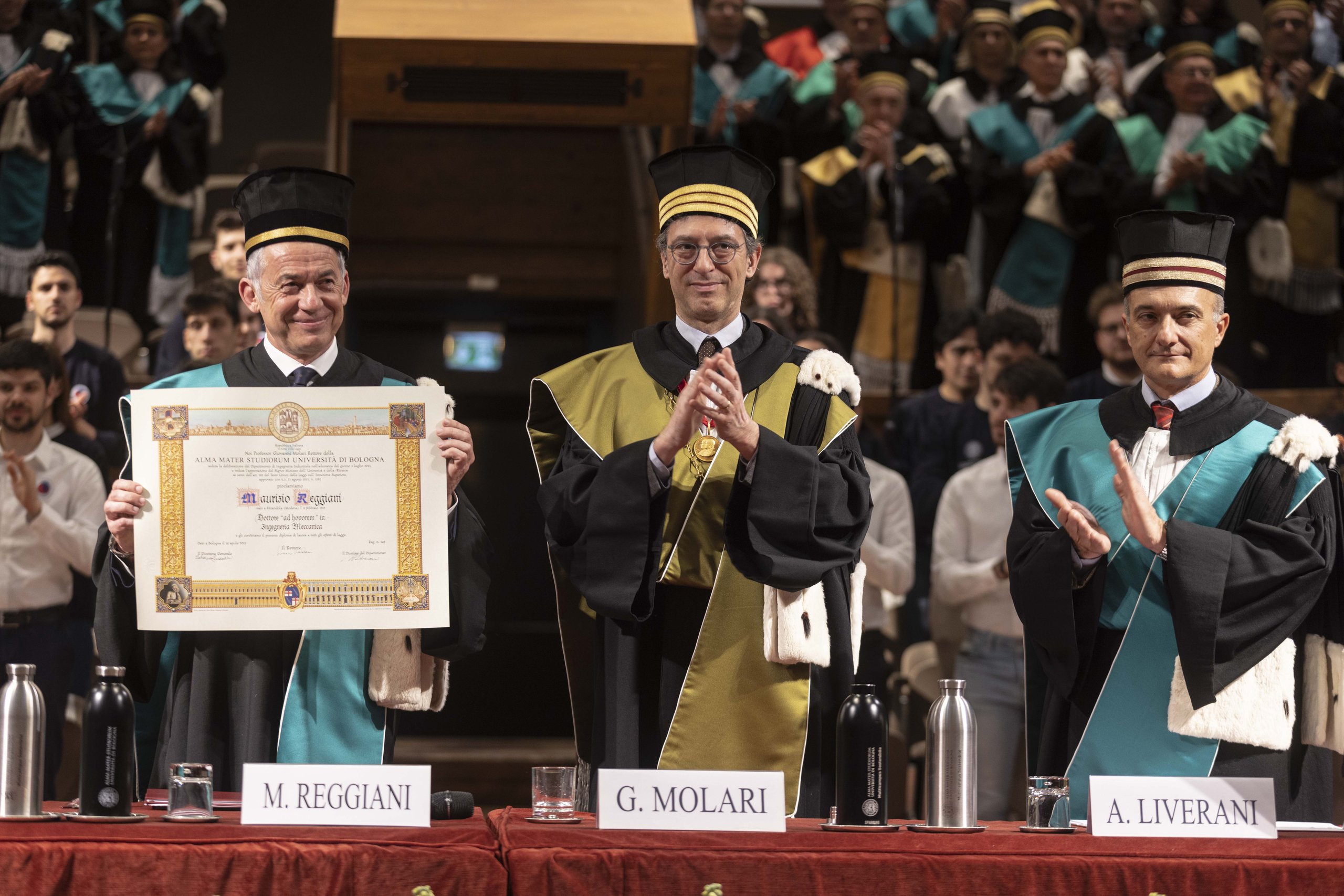 The Engineer Behind 160 Patents And Five Iconic Lamborghinis Earns Bologna'S Rarest Honor 7 Maurizio reggiani holding his honorary degree certificate as academics applaud during the ceremony