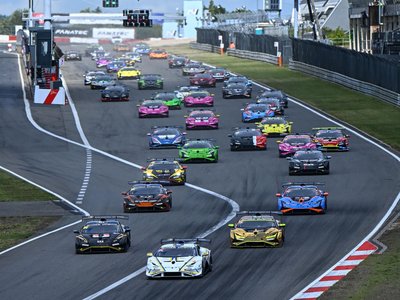 Super Trofeo Europe Joins The Fia Wec Bill At Imola, Placing Lamborghini'S Full Racing Ladder On One Stage 2 Full grid of lamborghini huracán super trofeo evo2 race cars lined up at the start of a race, displaying a variety of vibrant racing liveries