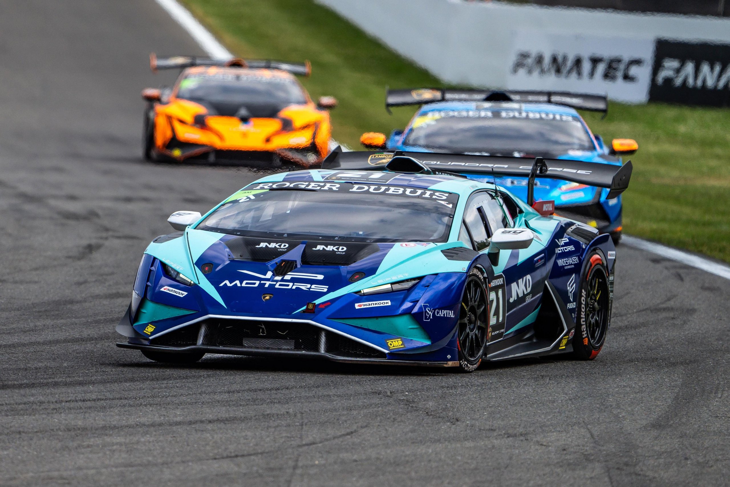 Half A Point Separates The Pro Leaders As Super Trofeo Europe Returns To The Nürburgring 7 Blue and teal lamborghini huracán super trofeo evo2 number 21 on track with two other cars visible behind