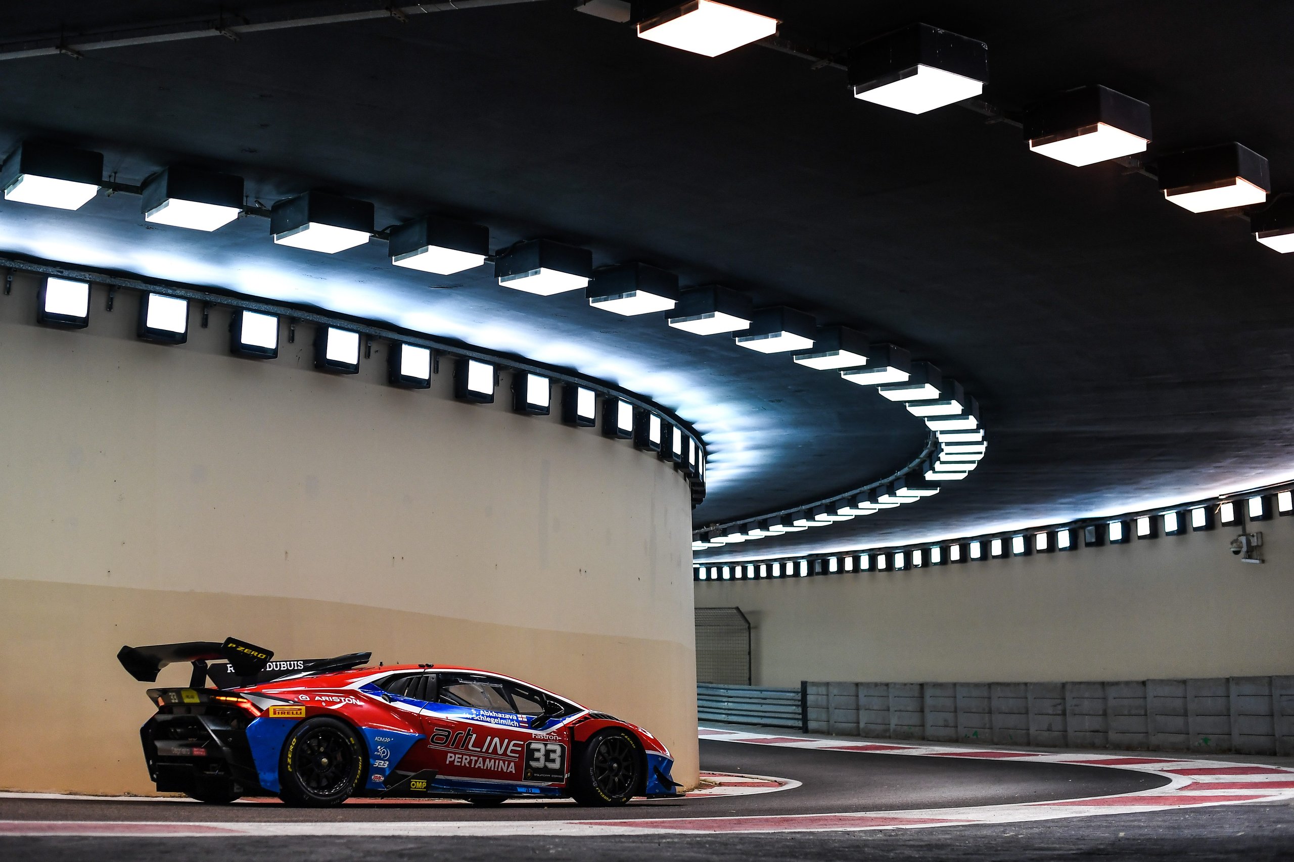 Lamborghini Super Trofeo Middle East Comeback Signals Squadra Corse'S Regional Ambitions For 2022 5 Red, blue, and white lamborghini huracán super trofeo evo race car number 33 inside a brightly lit tunnel on a racetrack