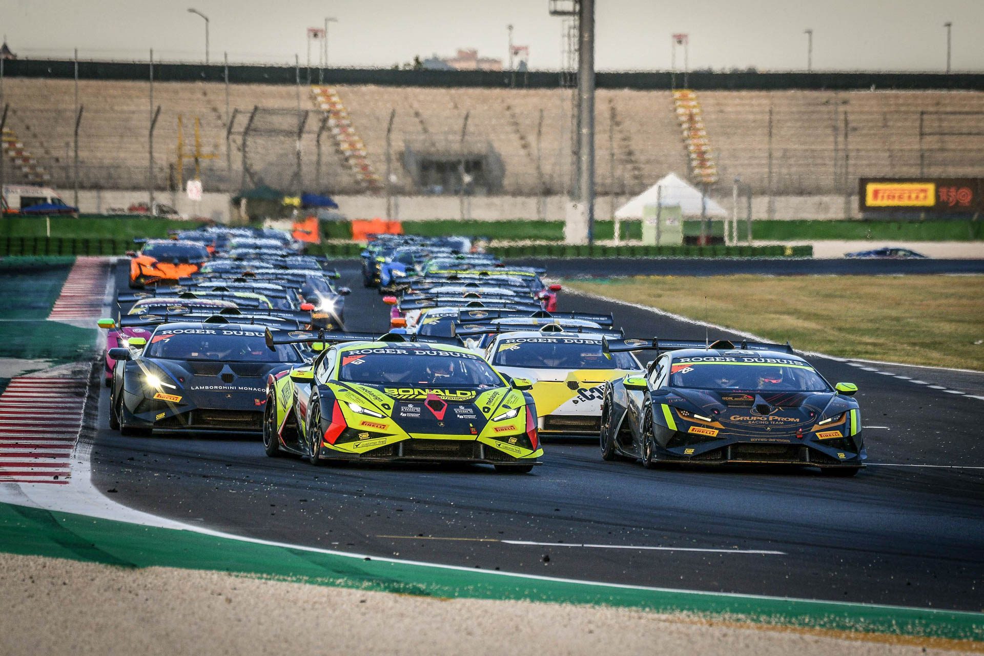 Six From Six: How Weering And Spinelli'S Record Run Reveals What Lamborghini'S Customer Racing Actually Builds 5 A full grid of lamborghini huracán super trofeo evo2 race cars in various liveries lined up on track