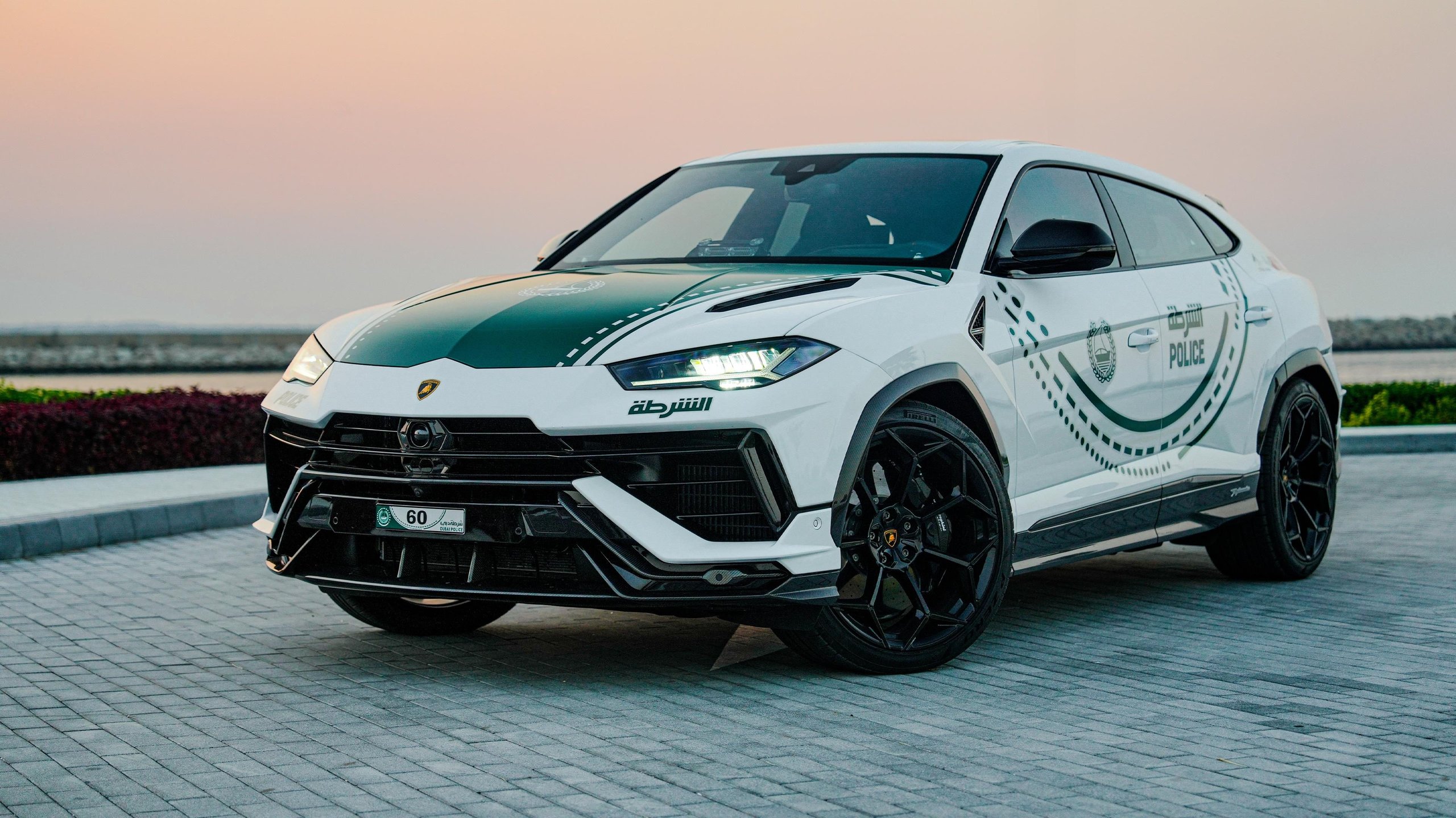Dubai Police'S Urus Performante Is Lamborghini'S Most Calculated Brand Play In The Middle East 3 Front three-quarter static view of the dubai police urus performante showing black wheels, aerodynamic body kit, and 60th anniversary plate