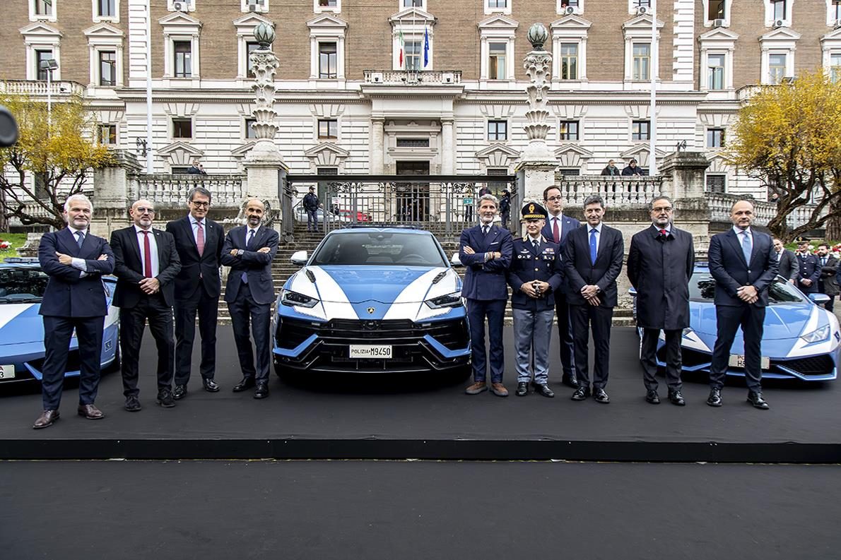 Italy'S Fastest Ambulance: The Urus Performante Now Runs Organs For The Highway Police 11 Group of officials and police personnel in front of the urus performante and huracán in police livery at the rome ceremony