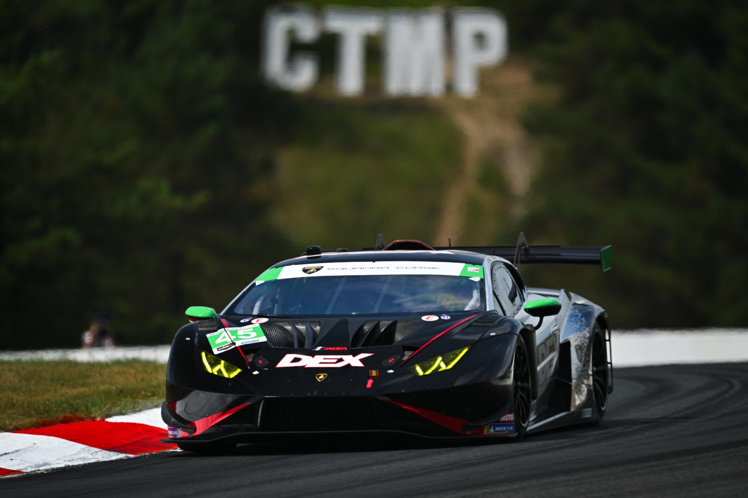 How Wayne Taylor Racing Turned A Cracked Rim And A Lap-One Spin Into Lamborghini'S First Imsa Win Of 2025 3 The #45 lamborghini huracán gt3 evo2 cornering hard at canadian tire motorsport park with ctmp signage visible in the background