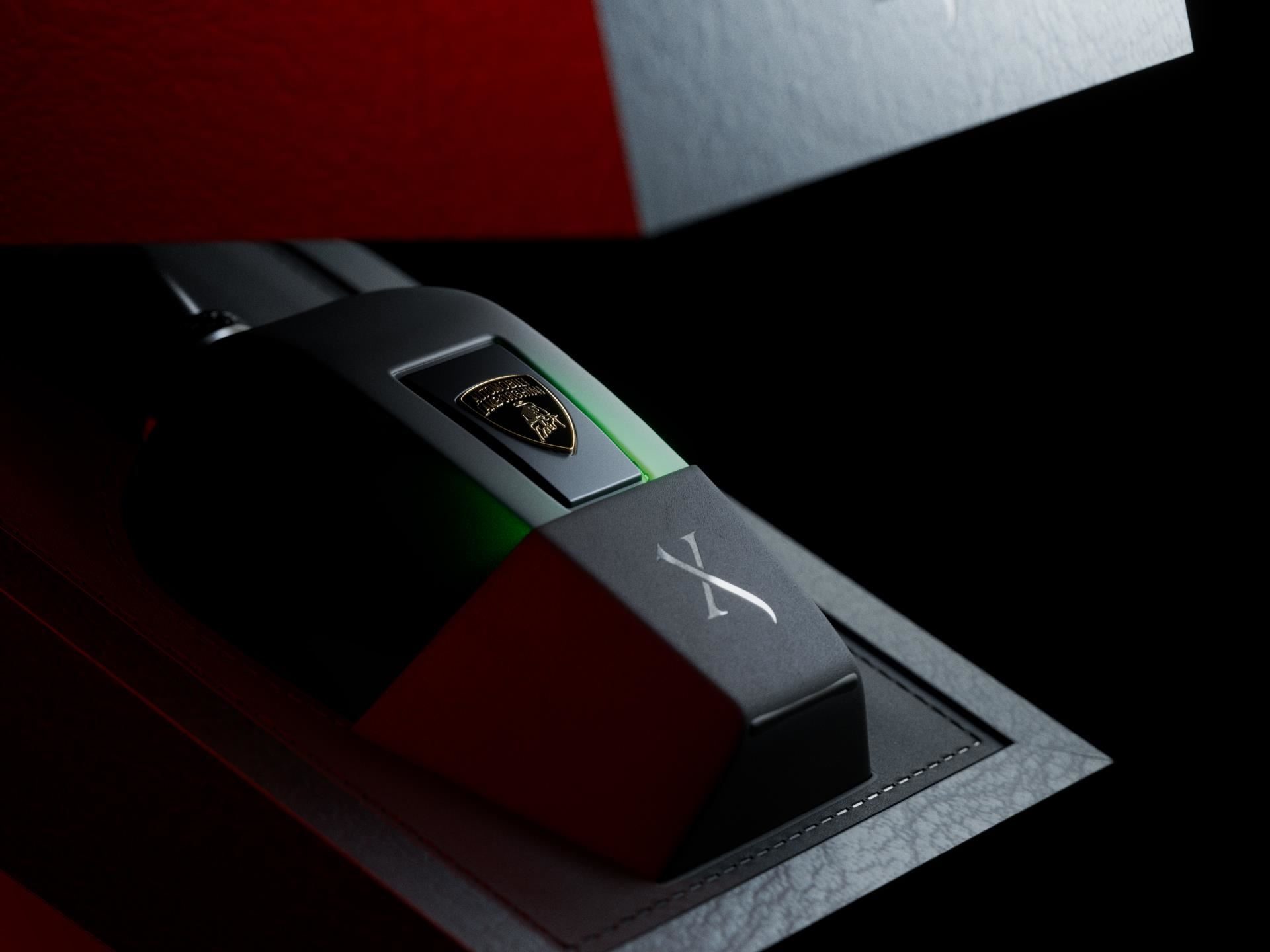 Close-up of the xerjoff x lamborghini fragrance bottle nestled in its dark luxury packaging with the lamborghini shield visible