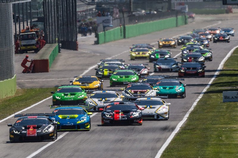 Full grid of Lamborghini Huracán Super Trofeo race cars battling for position during the 2017 Super Trofeo Europe season opener at Monza