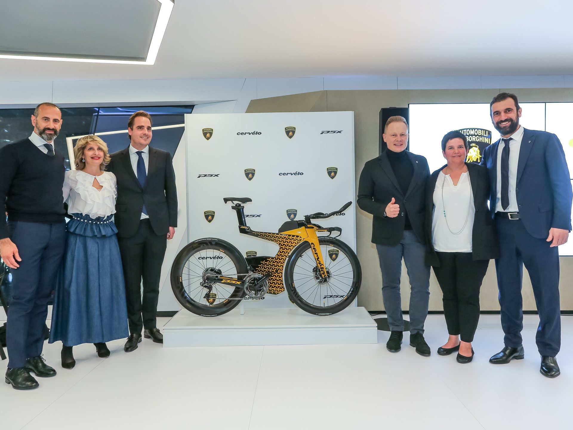 Cervélo P5X Lamborghini edition displayed at Geneva Motor Show with yellow and black geometric frame design