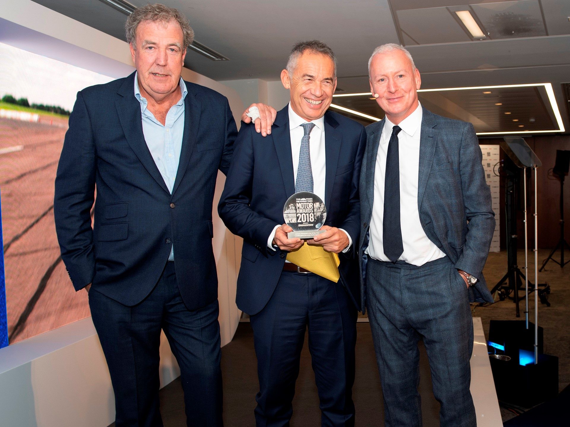 Jeremy Clarkson presenting the 2018 Car of the Year award to Lamborghini R&D Director Maurizio Reggiani at News Corp's London headquarters