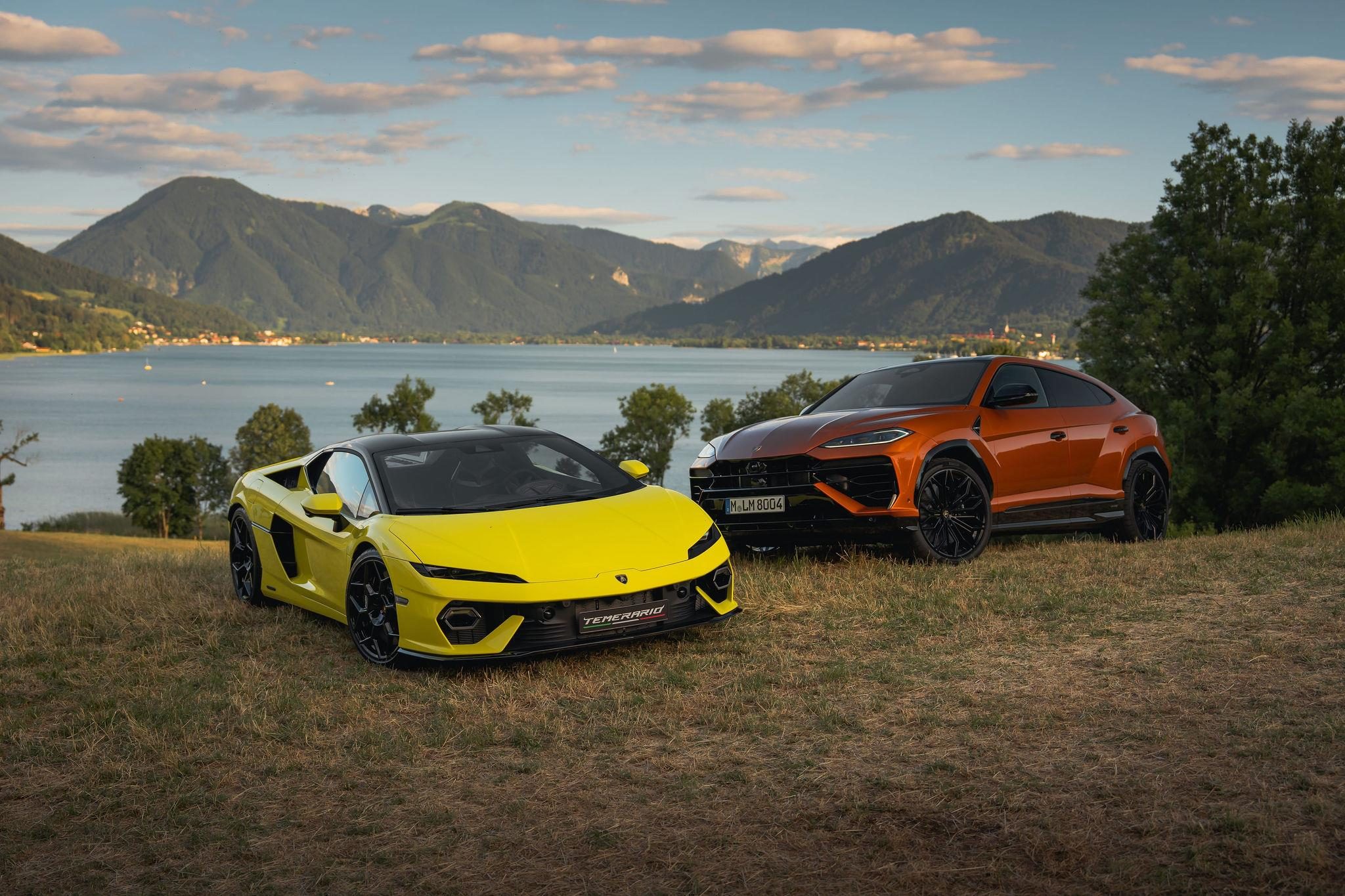 Fenomeno Roadster At Lake Tegernsee: Why Lamborghini Chose A Concours Lawn Over A Motor Show Stage 11 Yellow lamborghini fenomeno roadster and orange lamborghini urus parked on a grassy hill overlooking lake tegernsee and mountains