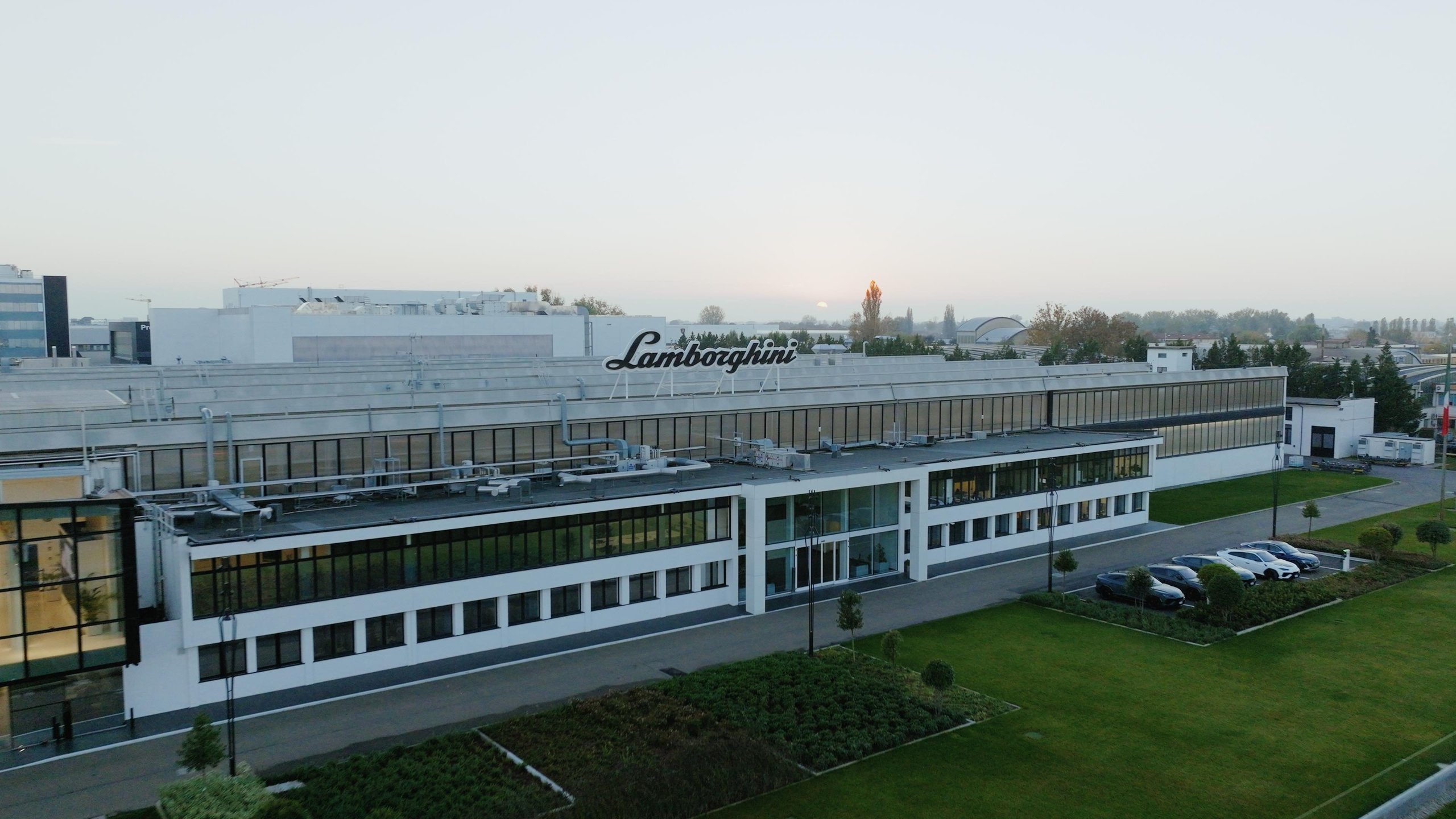 Lamborghini'S New Marketing Director Comes From Ducati, And That Choice Tells You Everything 5 Aerial view of the lamborghini factory in sant'agata bolognese with the brand's logo on the building