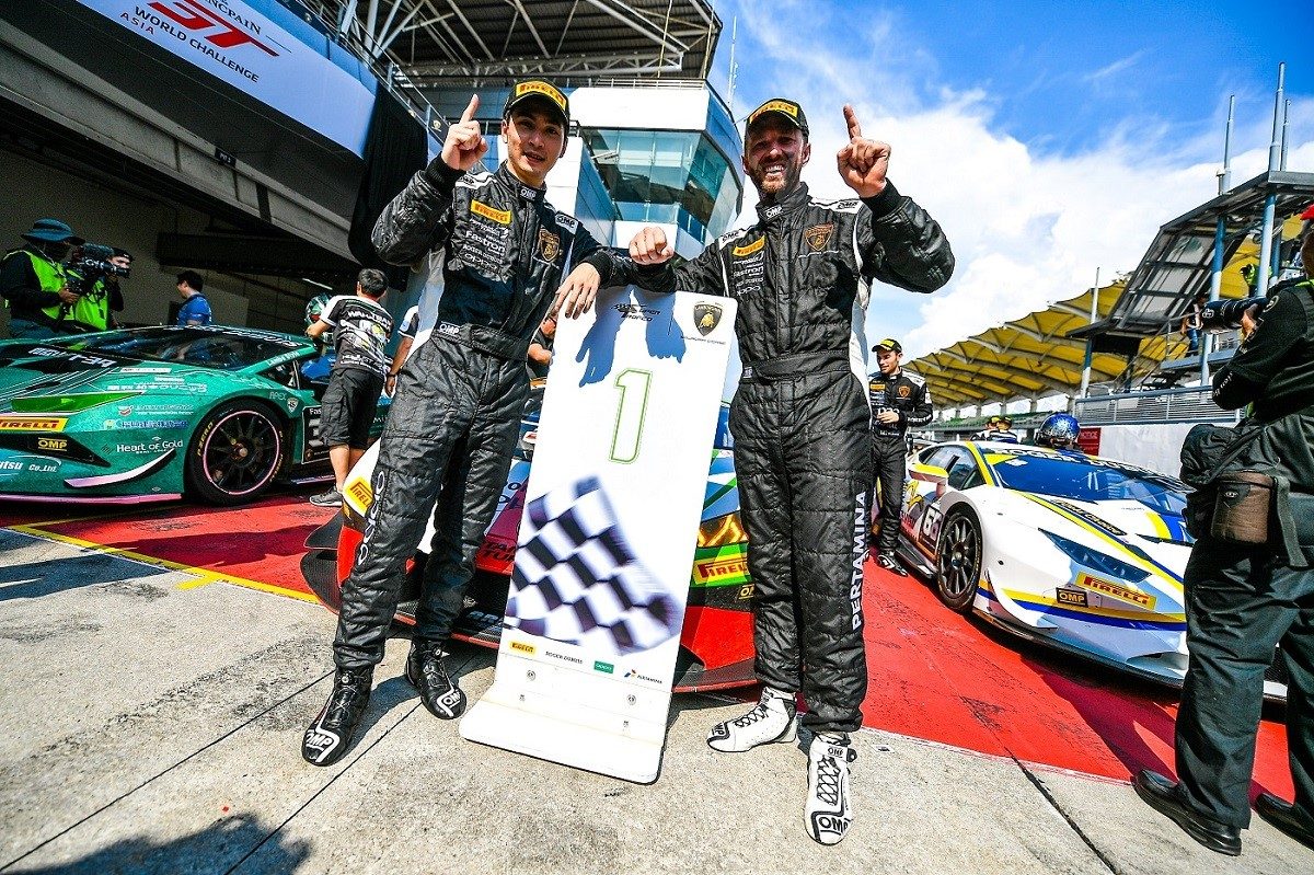 Evan Chen and Chris van der Drift celebrate their Lamborghini Super Trofeo Asia victory at Sepang International Circuit in 2019