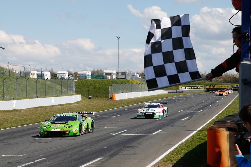Green Lamborghini Huracán GT3 takes the checkered flag at the 2016 ADAC GT Masters at Oschersleben