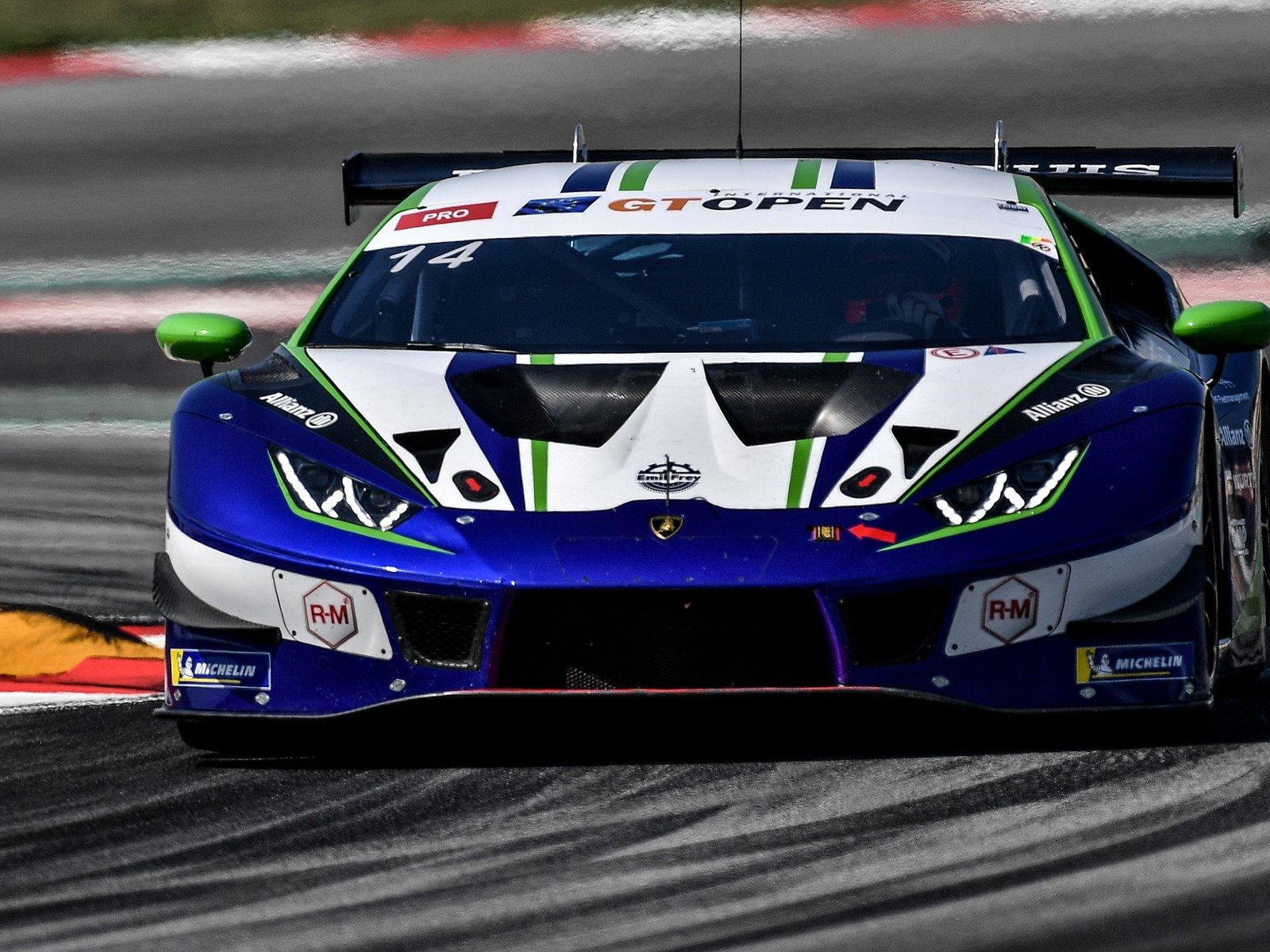 Lamborghini Huracán GT3 EVO number 14 at speed during the International GT Open at Barcelona