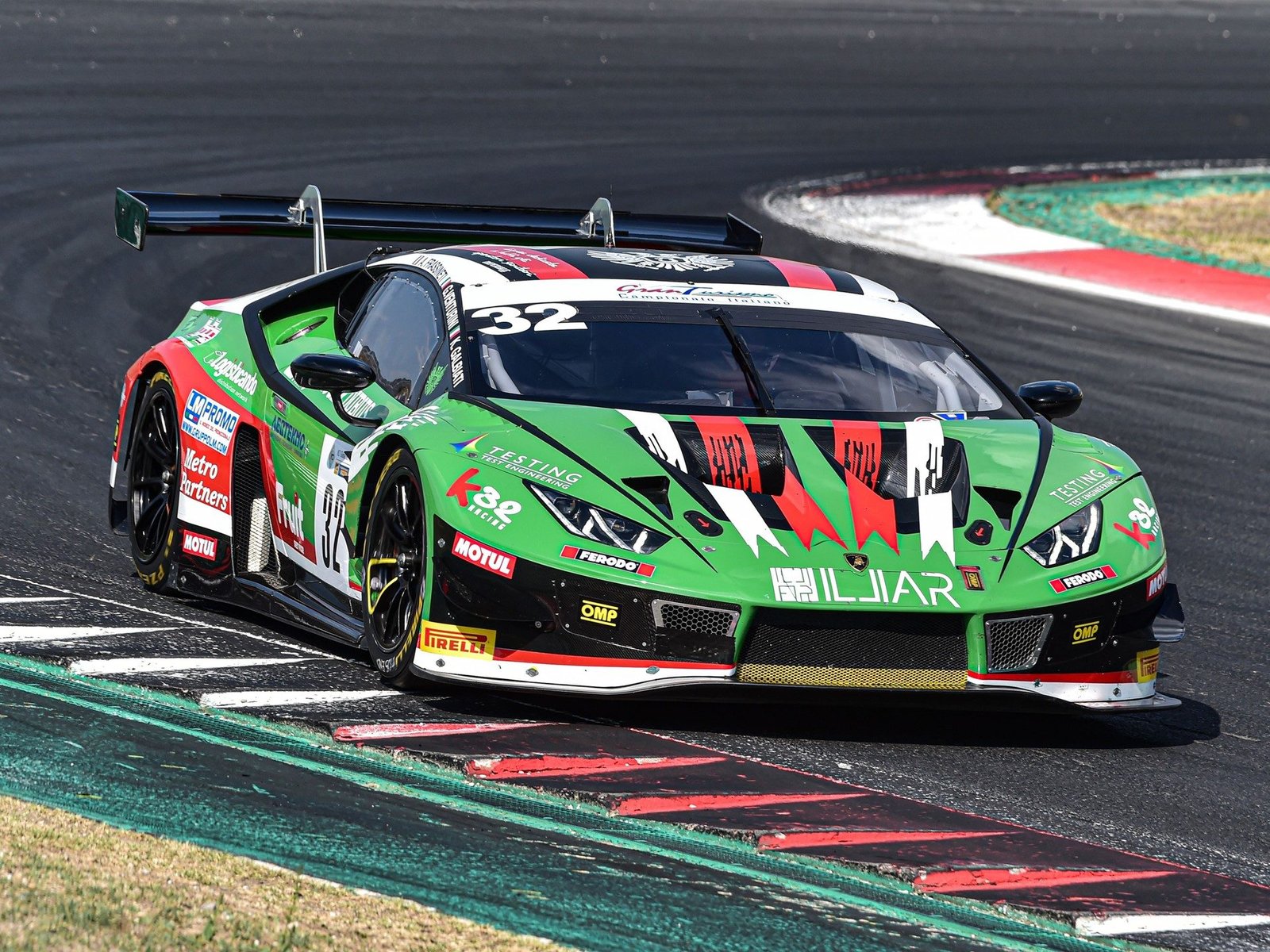 The #32 Imperiale Racing Lamborghini Huracán GT3 Evo in green, white, and red livery navigating a turn at Vallelunga