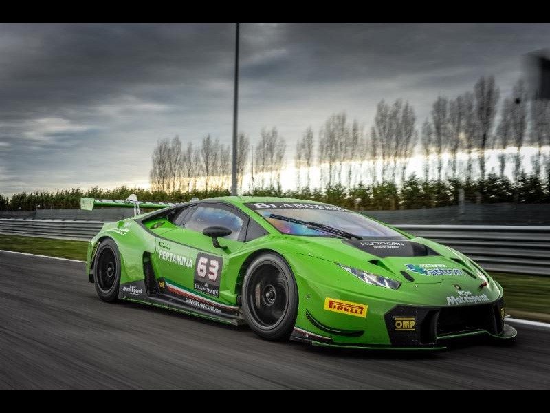 Lamborghini Huracán GT3 number 63 on track showing aggressive aerodynamic bodywork and large rear wing