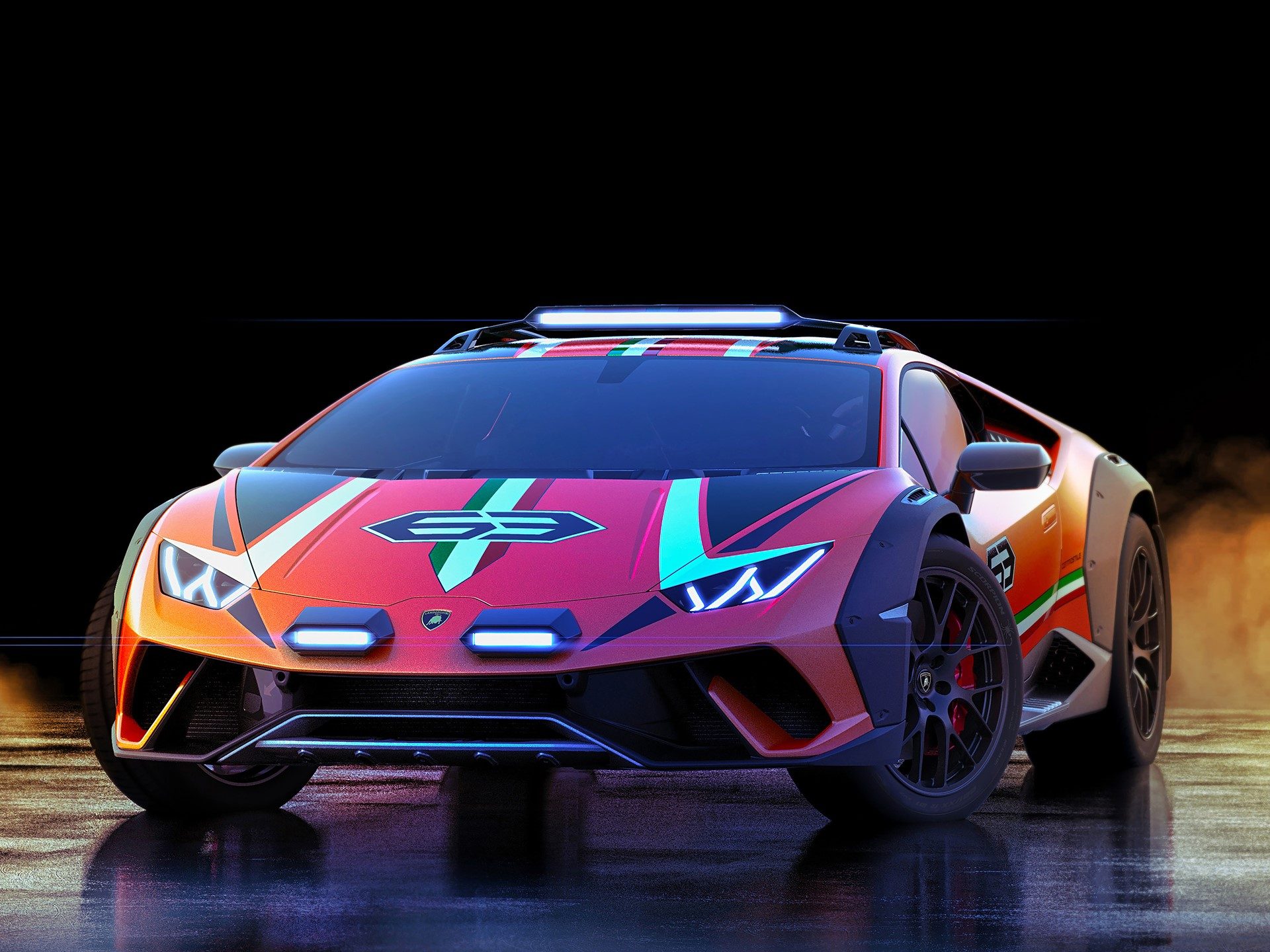 Detail view of the Huracán Sterrato concept showing balloon off-road tires, wide fender flares with integrated air intakes, and front auxiliary LED lights