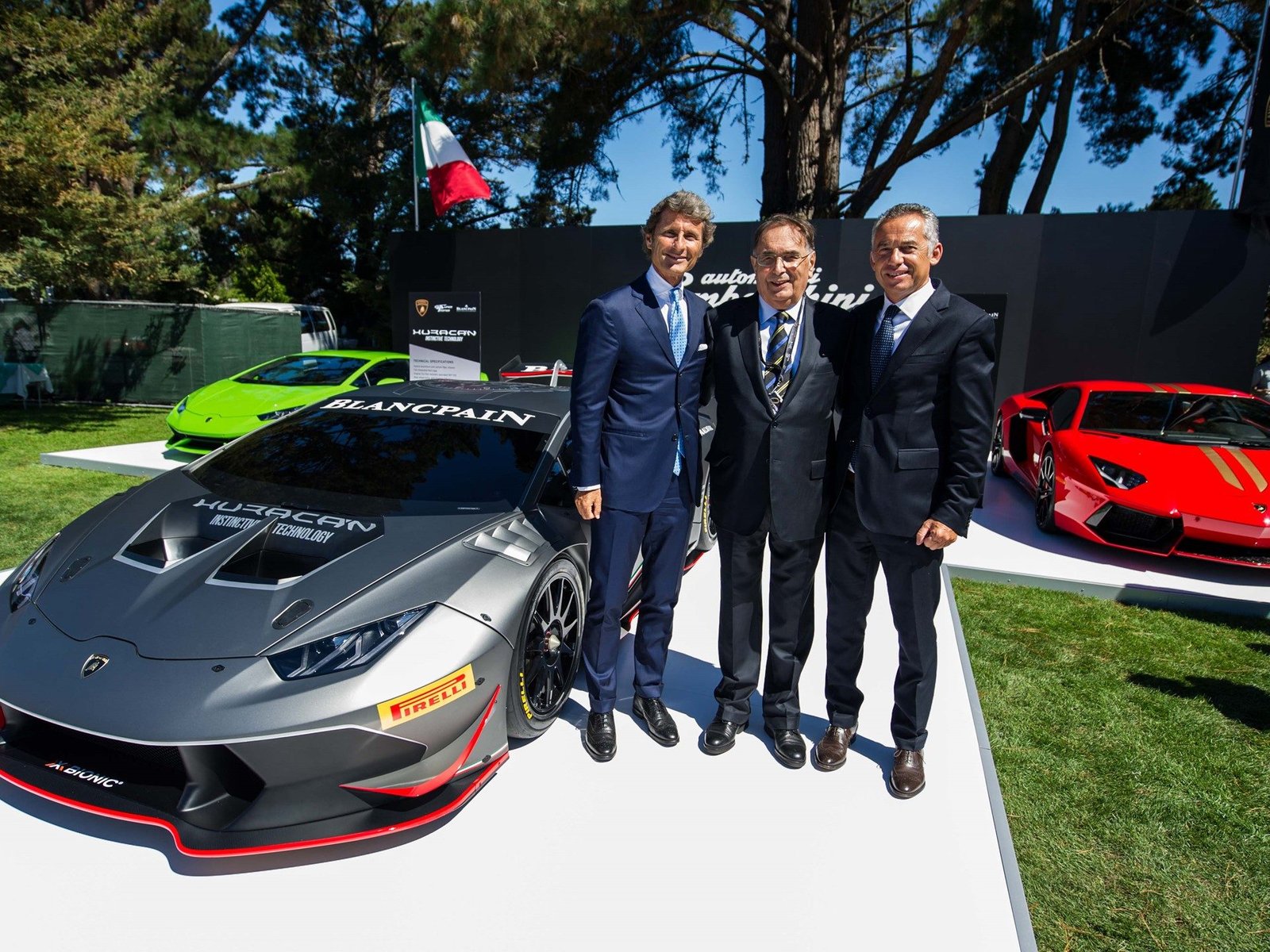 Lamborghini Huracán LP 620-2 Super Trofeo in grey livery at The Quail debut event, showing aggressive front aerodynamics and racing bodywork