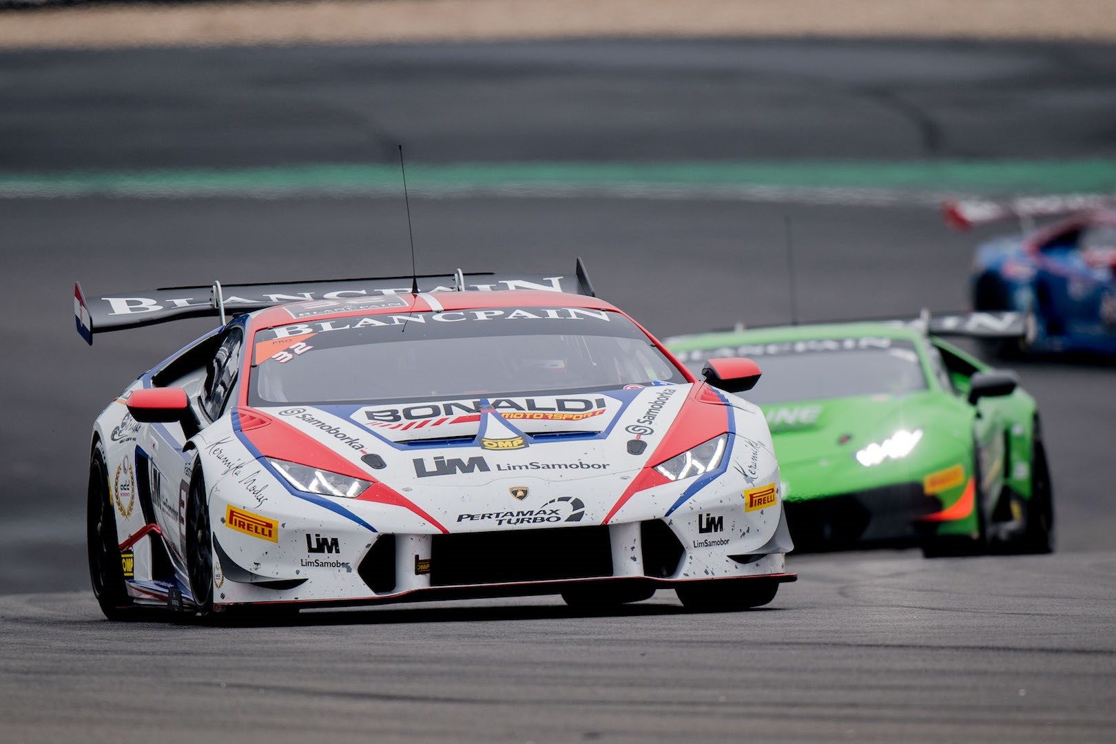 Lamborghini huracán super trofeo race cars battling for position on track during the blancpain super trofeo europe round at the nürburgring