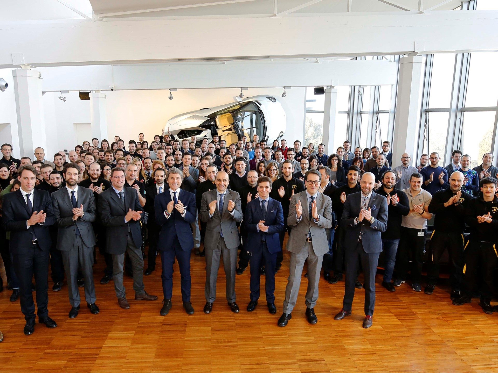 Lamborghini employees and executives gathered at Sant'Agata Bolognese celebrating workforce growth and record sales