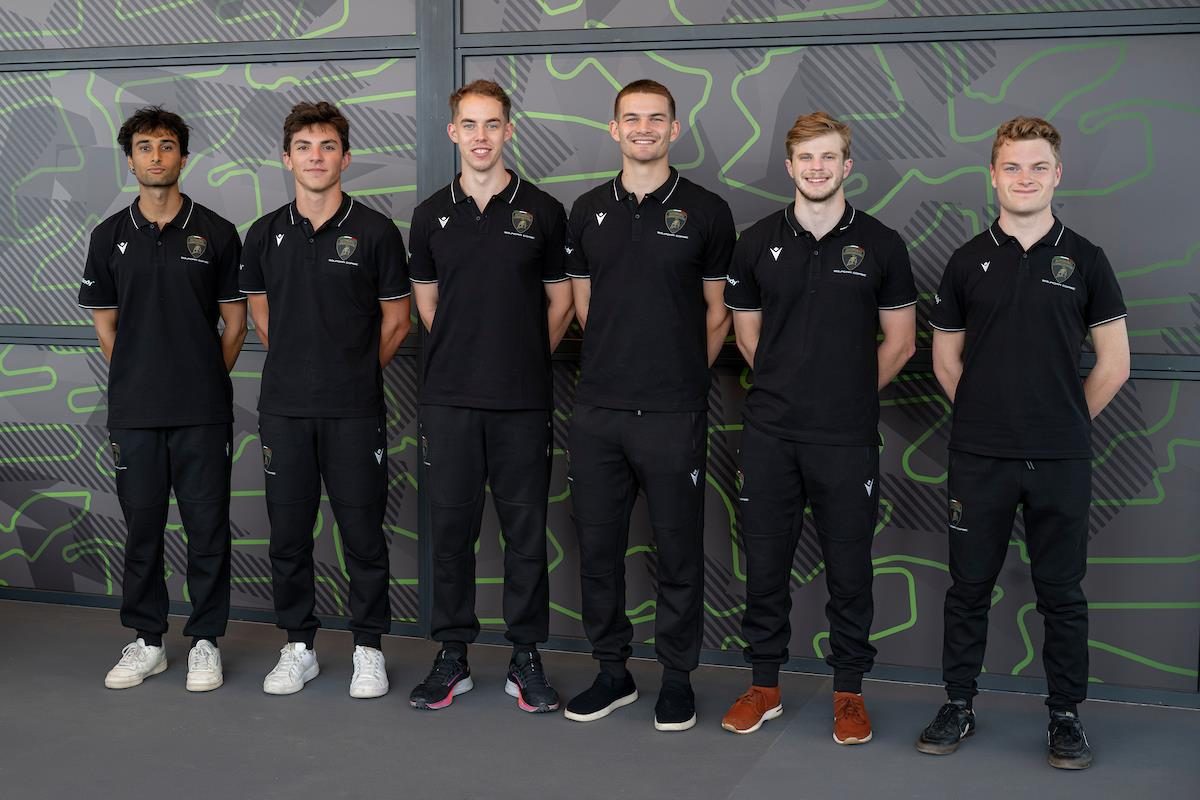 Thirty Drivers, One Goal: Inside Lamborghini'S 2026 Young Driver Programs And The Formula Medicine Gambit 9 Six young men in lamborghini squadra corse branded polo shirts standing in a line