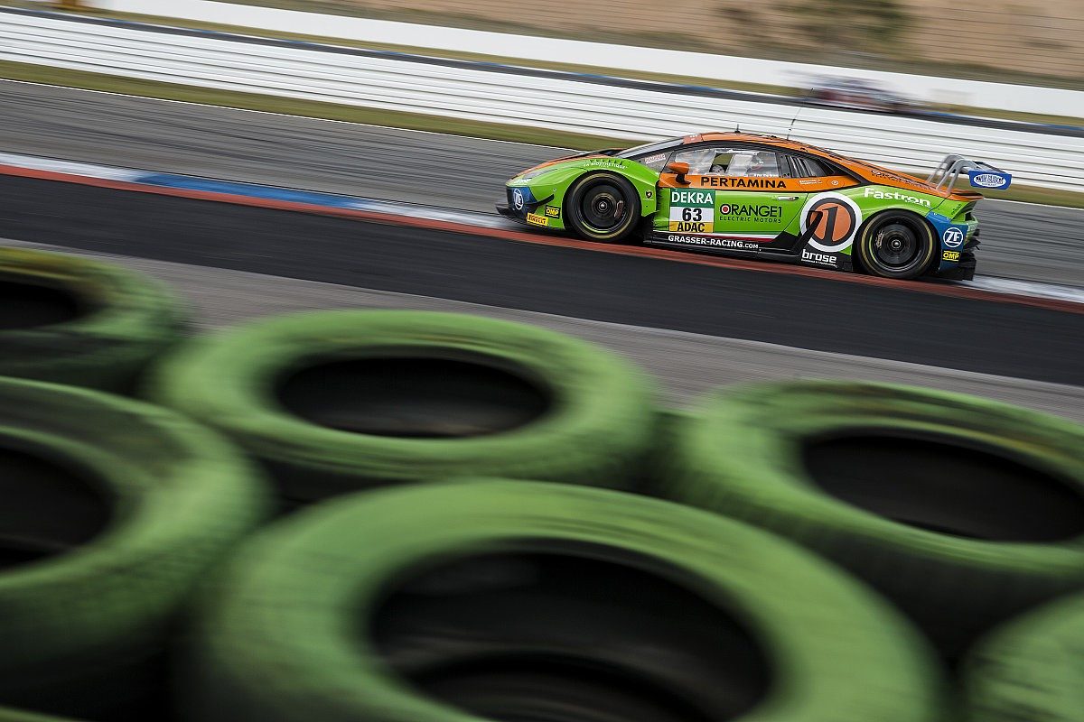 Lamborghini huracán gt3 evo in green and orange orange1 by grt grasser livery racing at the hockenheimring during the 2019 adac gt masters