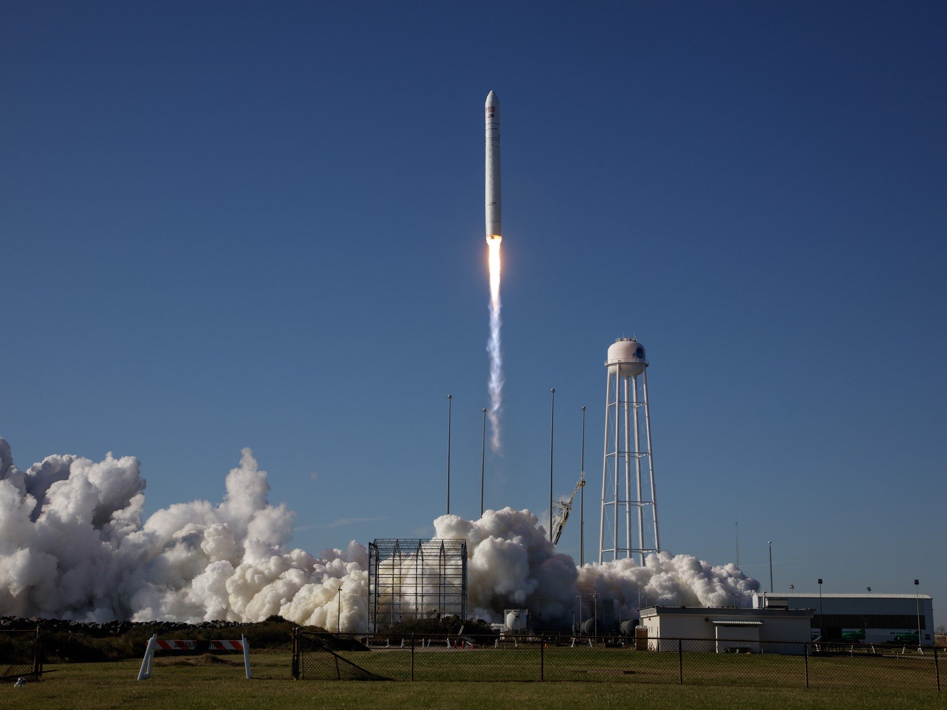 Northrop grumman antares rocket launching from wallops flight facility carrying lamborghini carbon fiber samples to the international space station