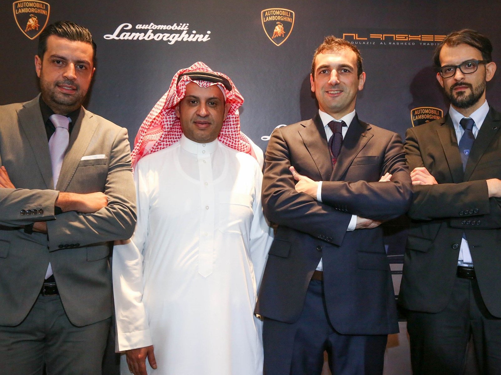 Executives from Lamborghini and Al Rasheed Group at the Collezione Automobili Lamborghini flagship store launch in Dubai Mall