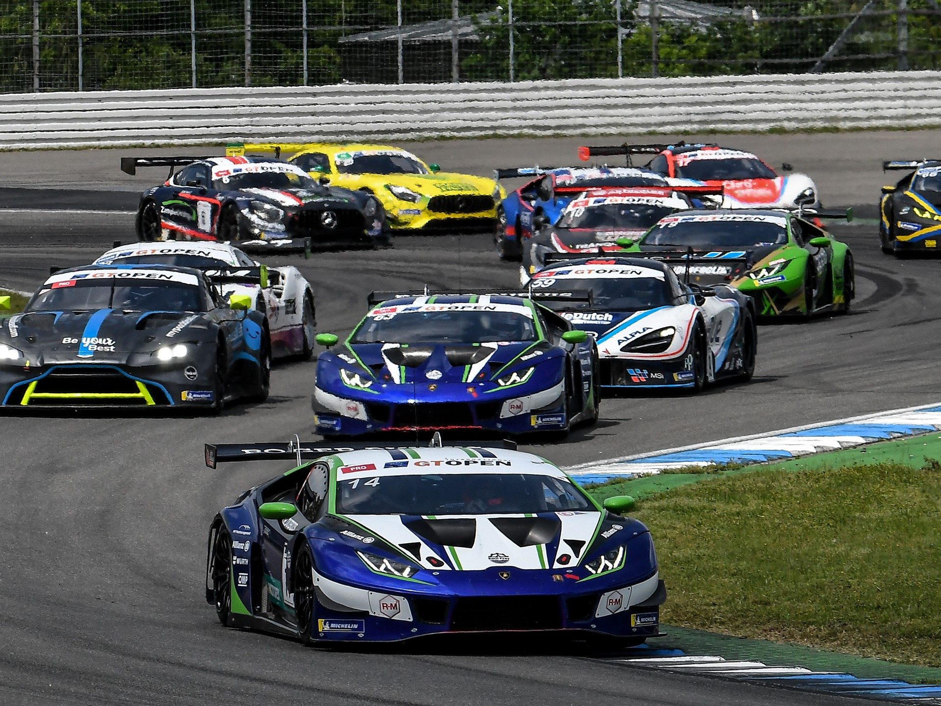 Lamborghini huracán gt3 evo race cars in team emil frey racing livery competing at the international gt open at hockenheimring