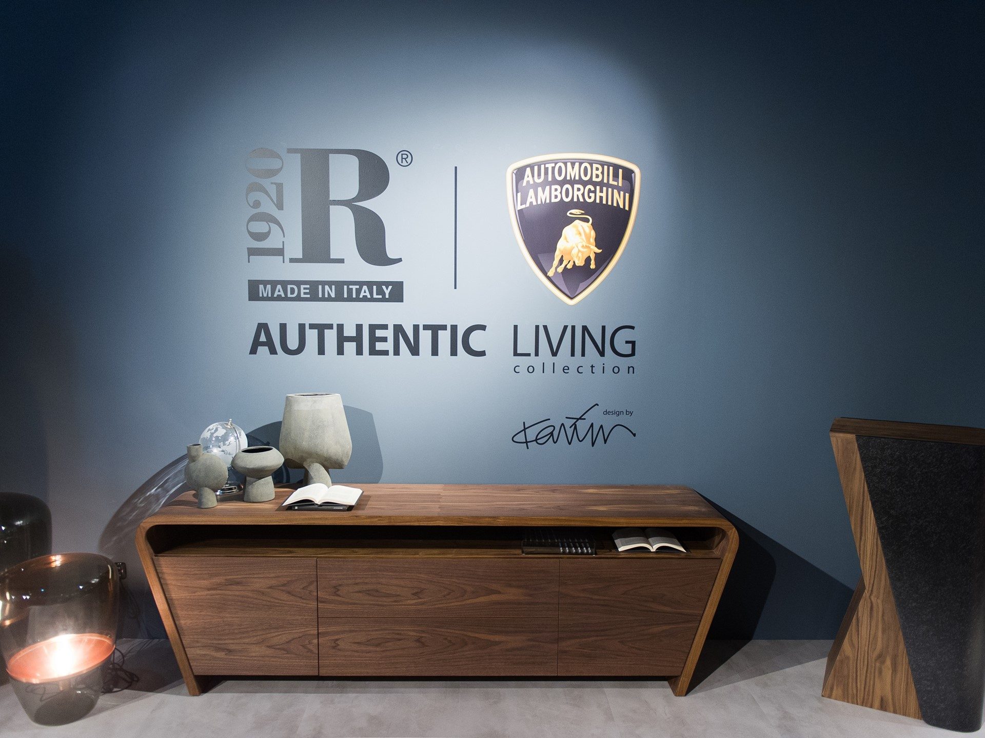 Wooden console table from Lamborghini and Riva 1920 Authentic Living collection with brand logos visible
