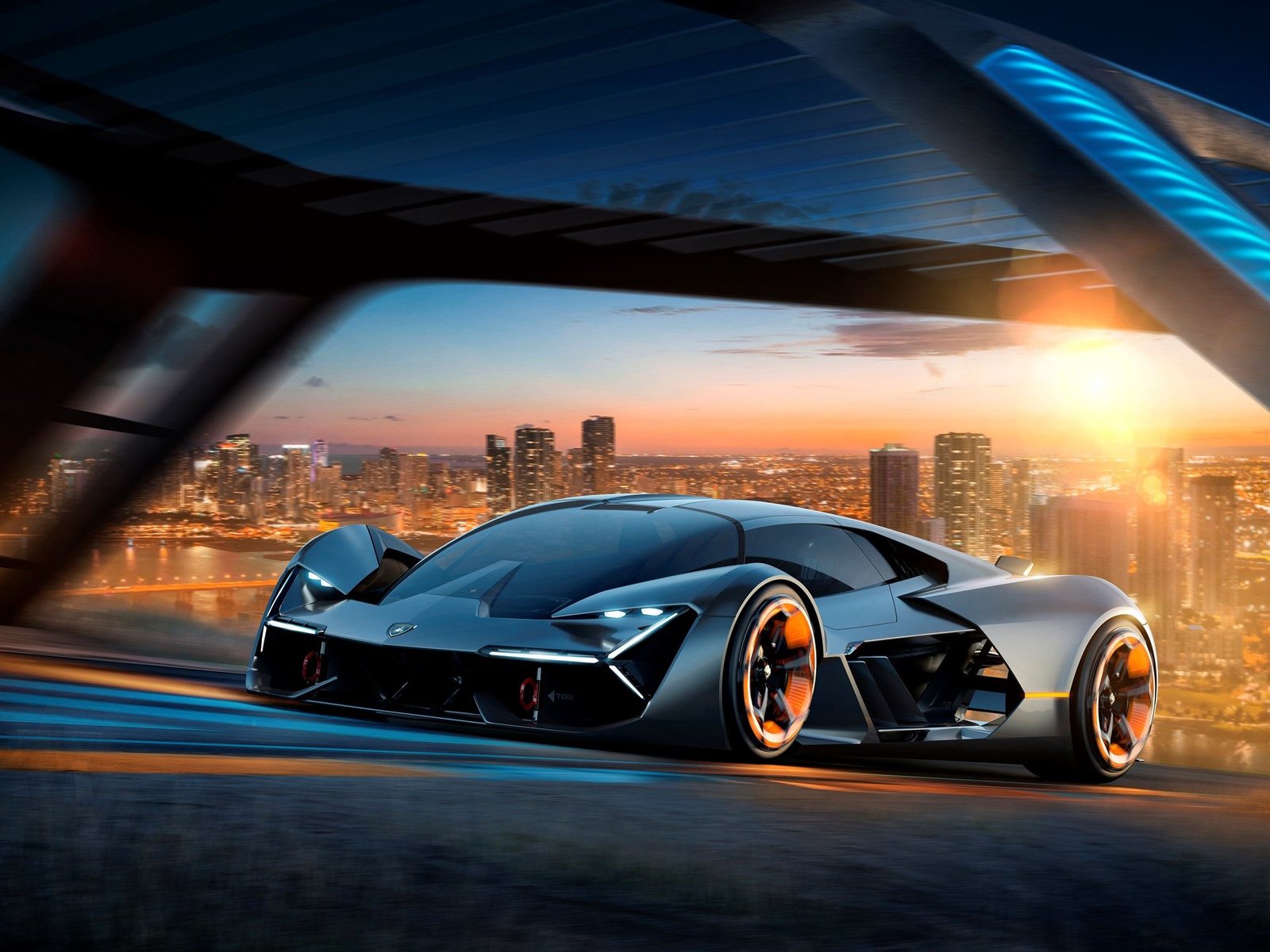 Lamborghini Terzo Millennio concept car with illuminated orange in-wheel motors and angular aerodynamic bodywork