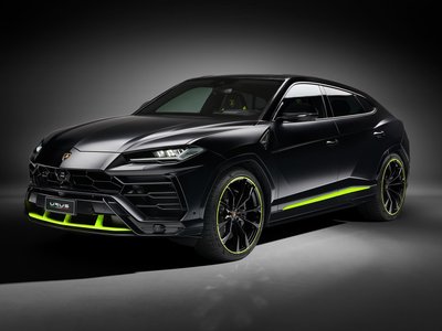 The Urus Graphite Capsule Gives Lamborghini'S Super Suv A Factory-Backed Stealth Mode 2 Lamborghini urus graphite capsule in matte black with vivid green accent details on the front splitter, side sills, and 23-inch taigete wheels