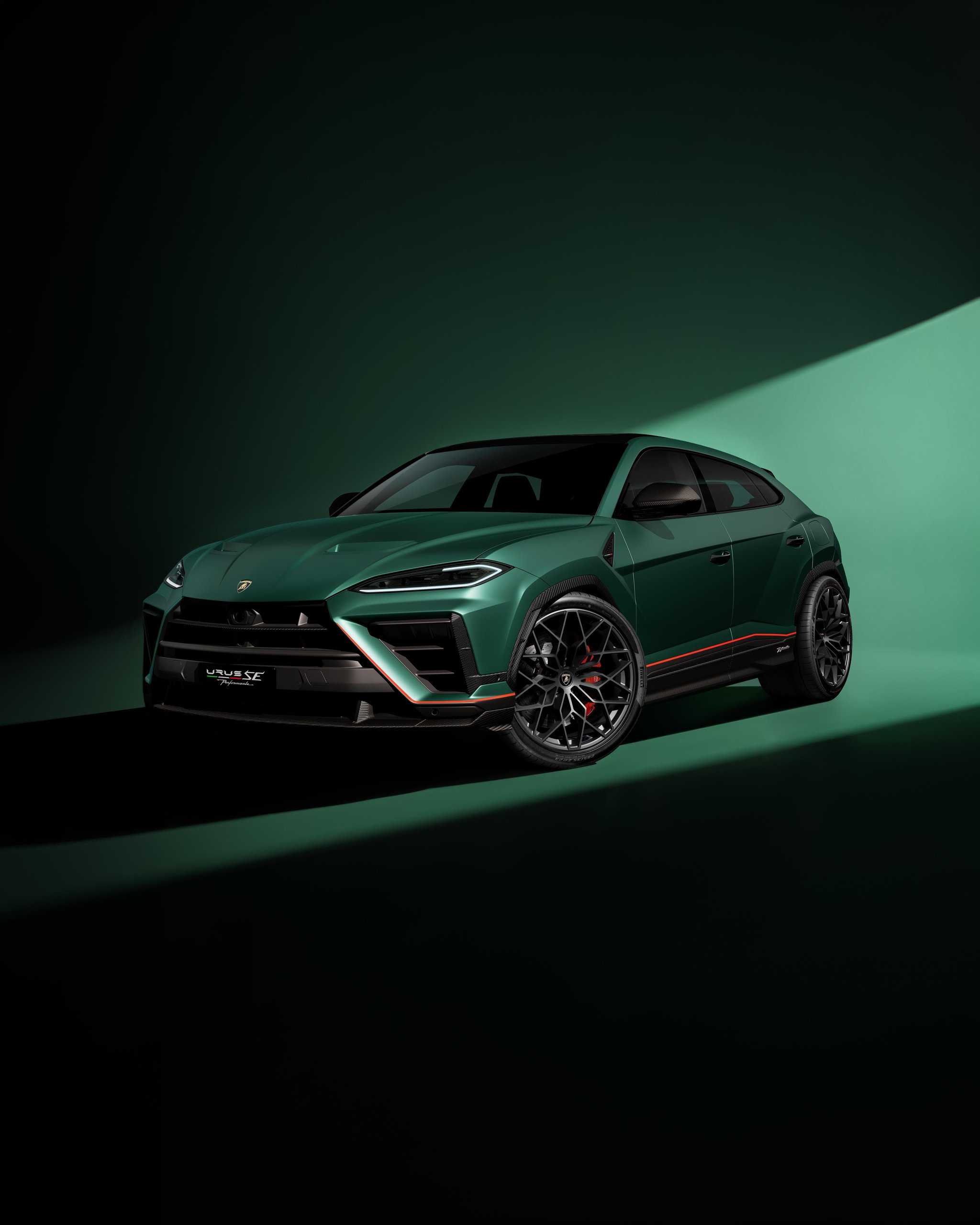Lamborghini urus se performante in dark green with orange accents, front three-quarter studio view