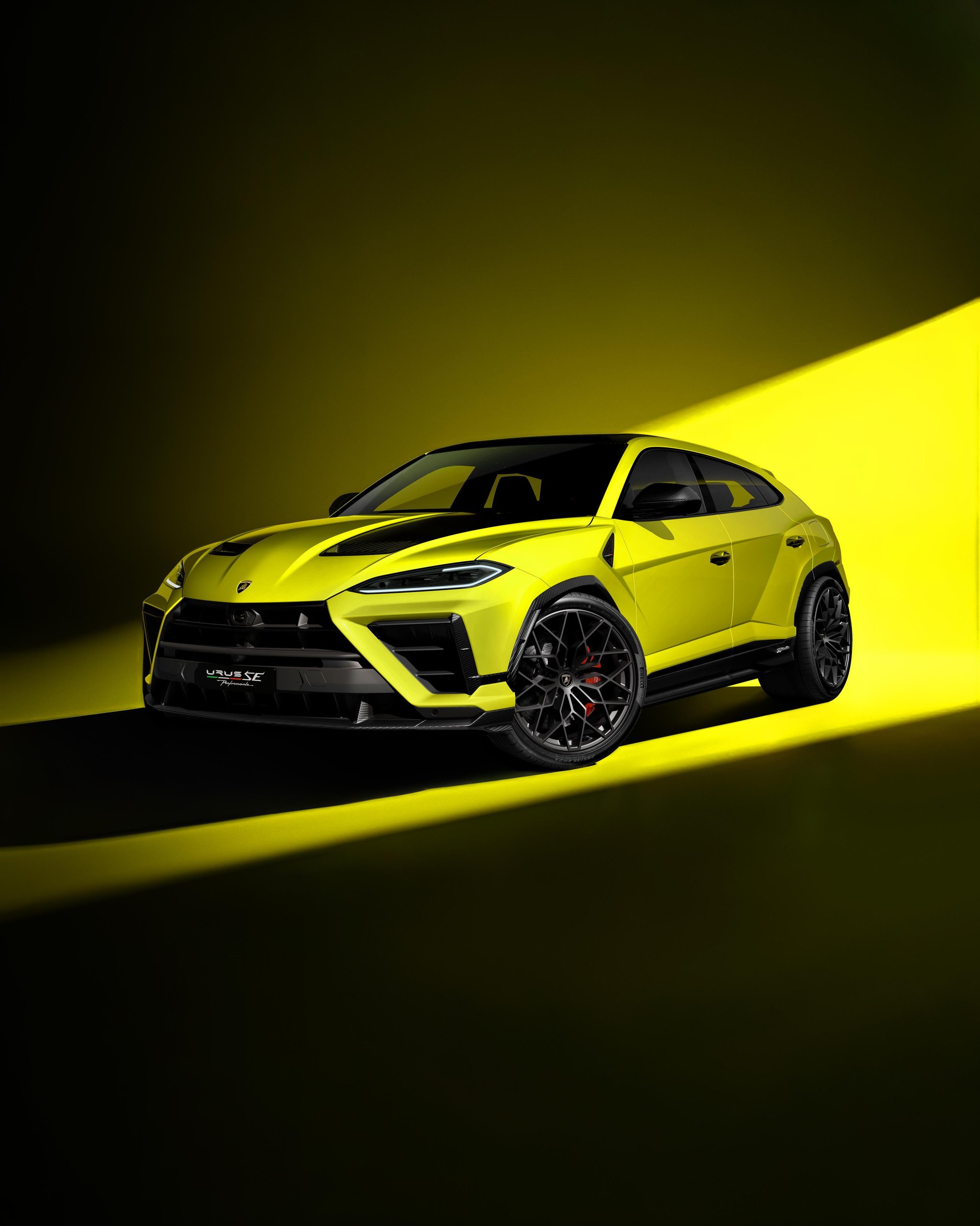 Lamborghini Urus Se Performante: 812 Cv And The Engineering Paradox That Makes It The Fastest Urus Ever 1 Lamborghini urus se performante in lime green, front three-quarter studio shot showing carbon fiber hood and aggressive front fascia