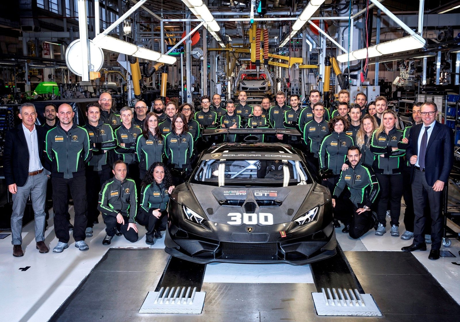Lamborghini Squadra Corse team members celebrate the 300th racing Huracán in the Sant'Agata Bolognese factory