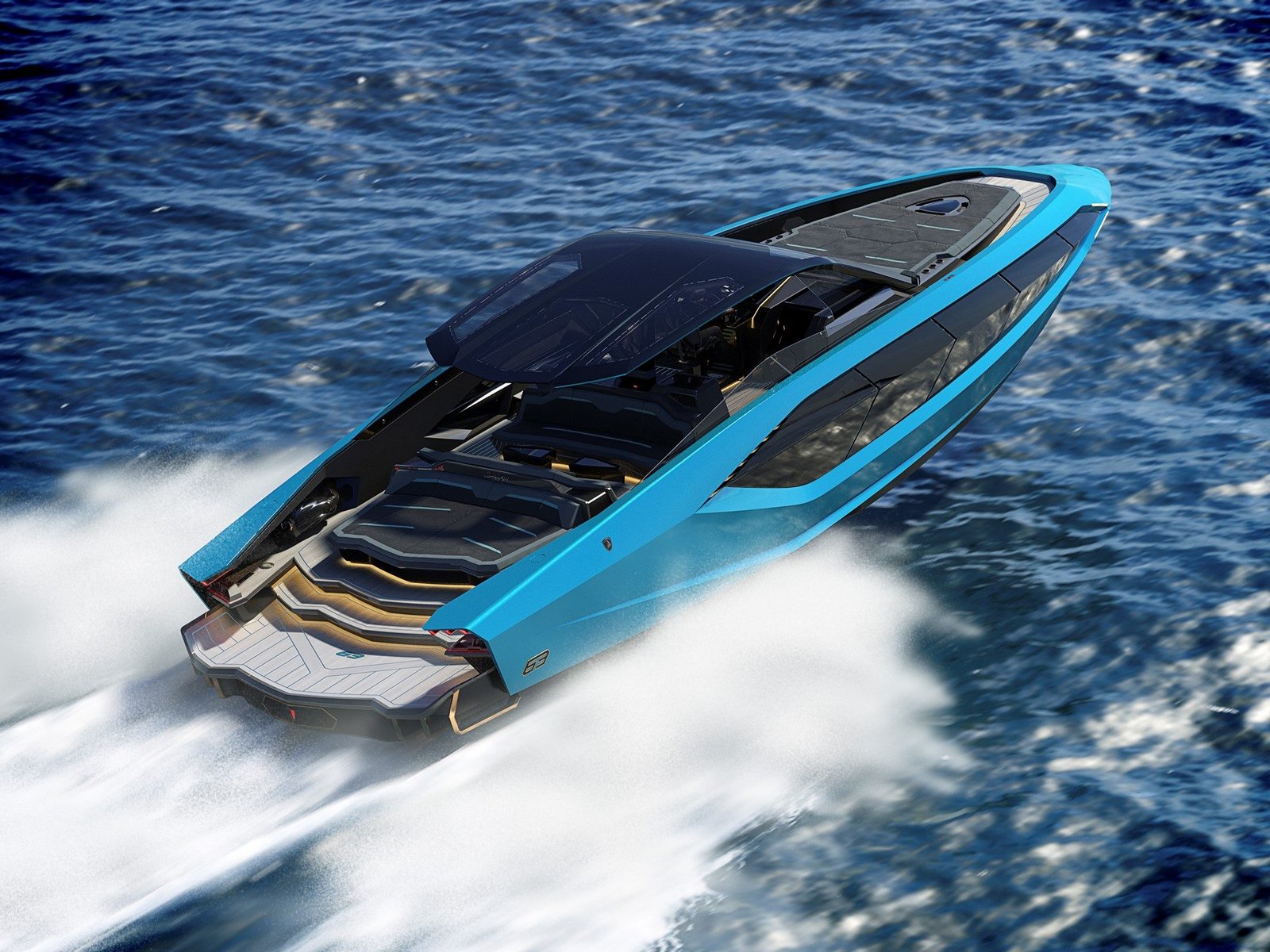 The Tecnomar for Lamborghini 63 yacht at speed, showing its sharp lines, hexagonal design motifs, and low-slung profile from above