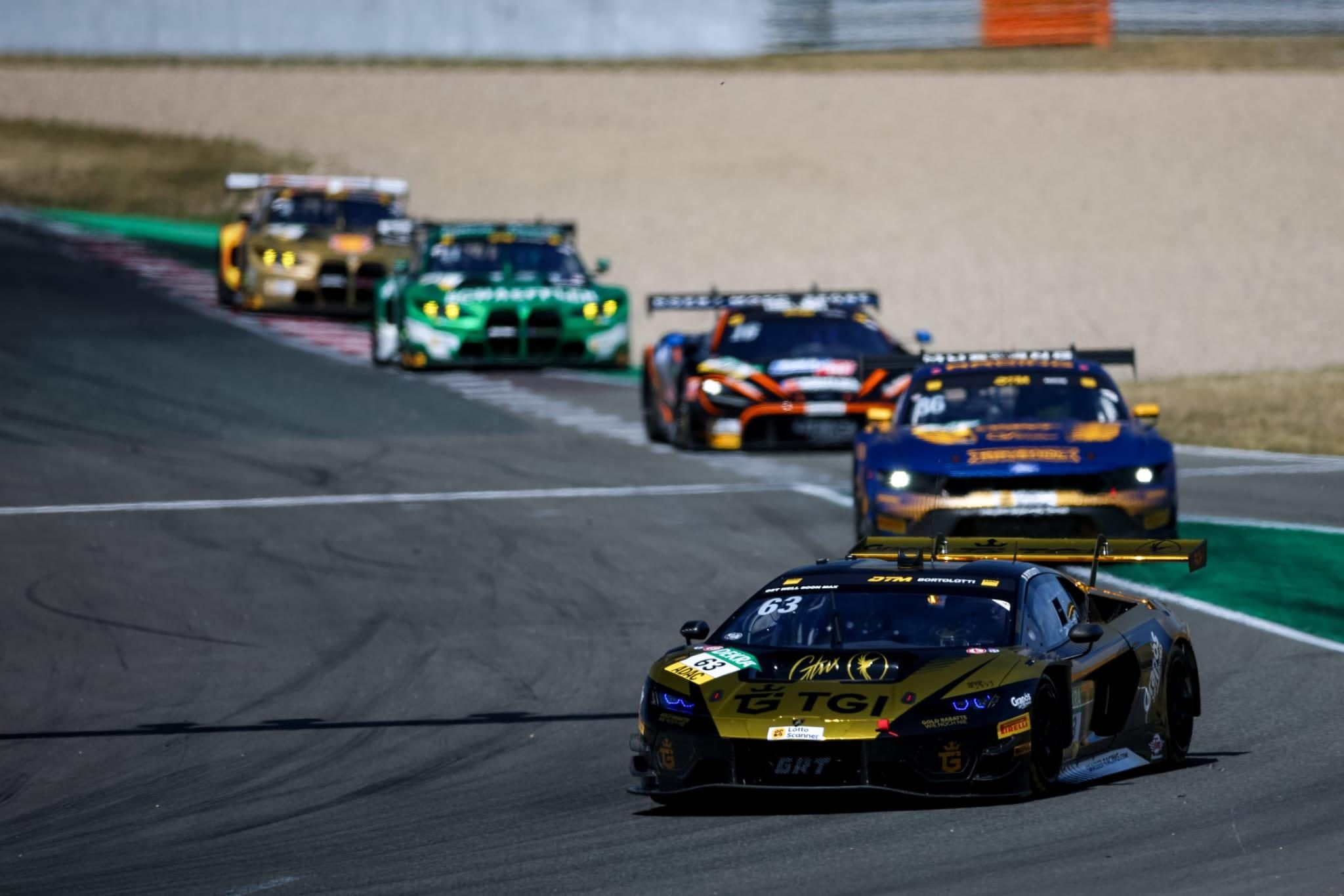 Temerario Gt3 Wins At Oschersleben: Lamborghini'S In-House V8 Racer Passes Its Biggest Test Yet 3 Black and yellow lamborghini temerario gt3 leading a pack of gt3 cars on the oschersleben circuit