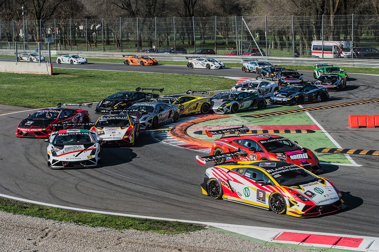 Fleet of Lamborghini Gallardo Super Trofeo race cars navigating a turn during the Blancpain Super Trofeo World Final