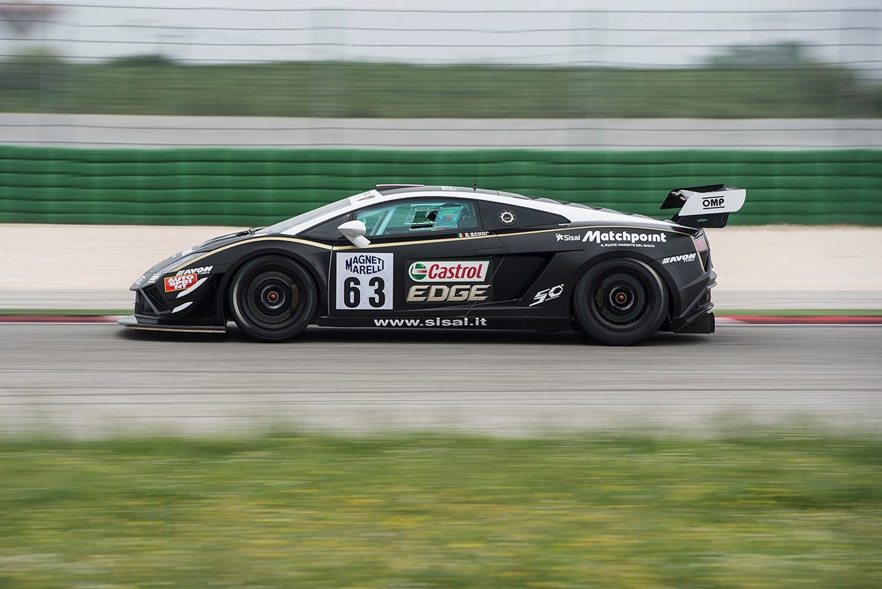 Lamborghini Gallardo GT3 FL2 racing on track with visible roll cage, racing slicks, and carbon fiber aerodynamic components