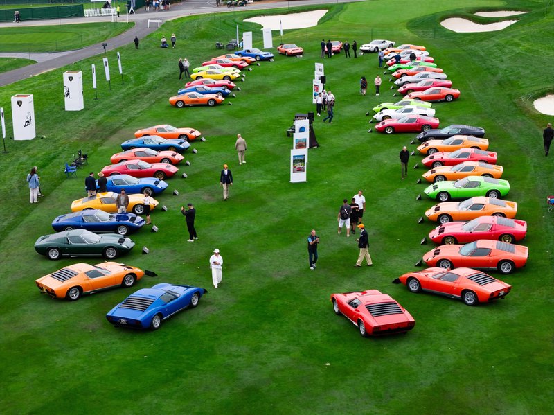 Aerial view of 43 Lamborghini Miuras in assorted colors displayed on the third fairway at Pebble Beach during Monterey Car Week 2026