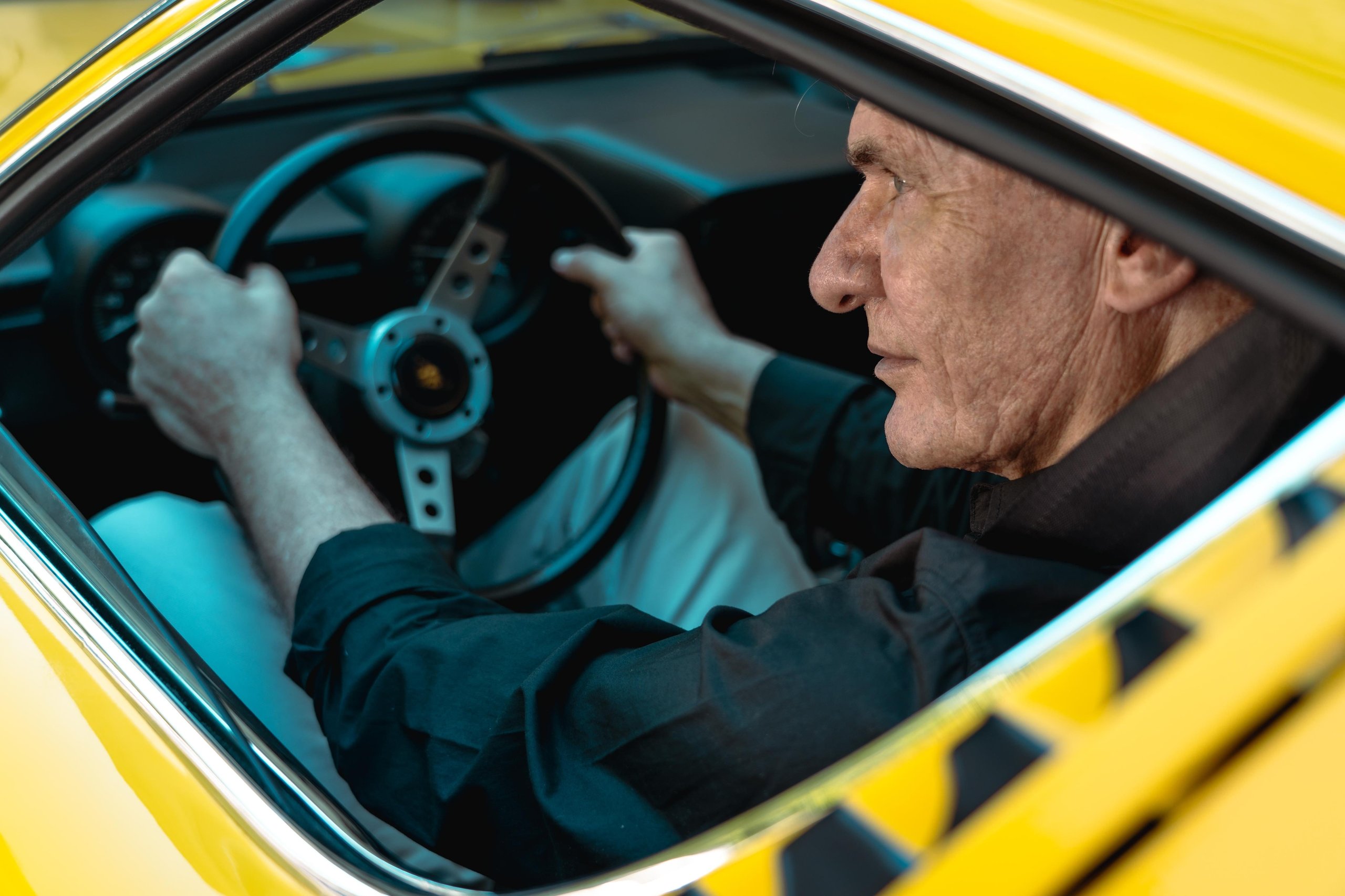 Lamborghini'S Miura Sv At 55: Why An Astronaut Behind The Wheel Says More Than Any Spec Sheet 5 Profile shot of paolo nespoli driving the yellow lamborghini miura sv with hands on the steering wheel