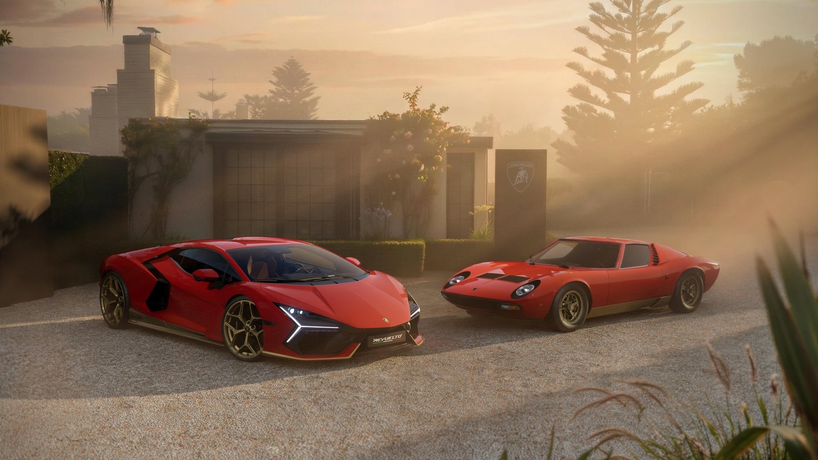 Red Lamborghini Revuelto Miura 60° Homage parked alongside a red Lamborghini Miura on a gravel driveway at sunset