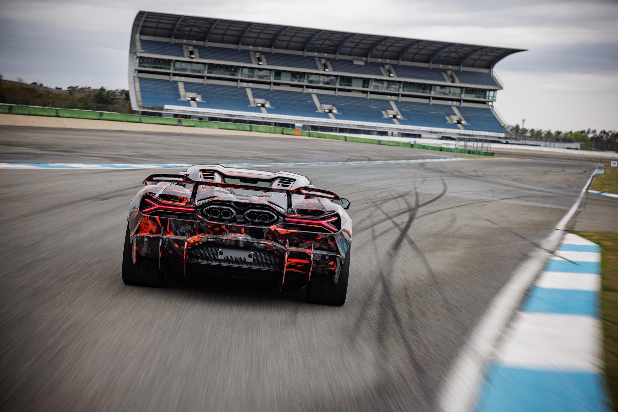 Revuelto Sv Claims Hockenheimring Production Car Record Before Anyone Even Knows Its Specs 6 Rear view of the lamborghini revuelto sv prototype showing large rear wing, diffuser, and high-mounted exhaust
