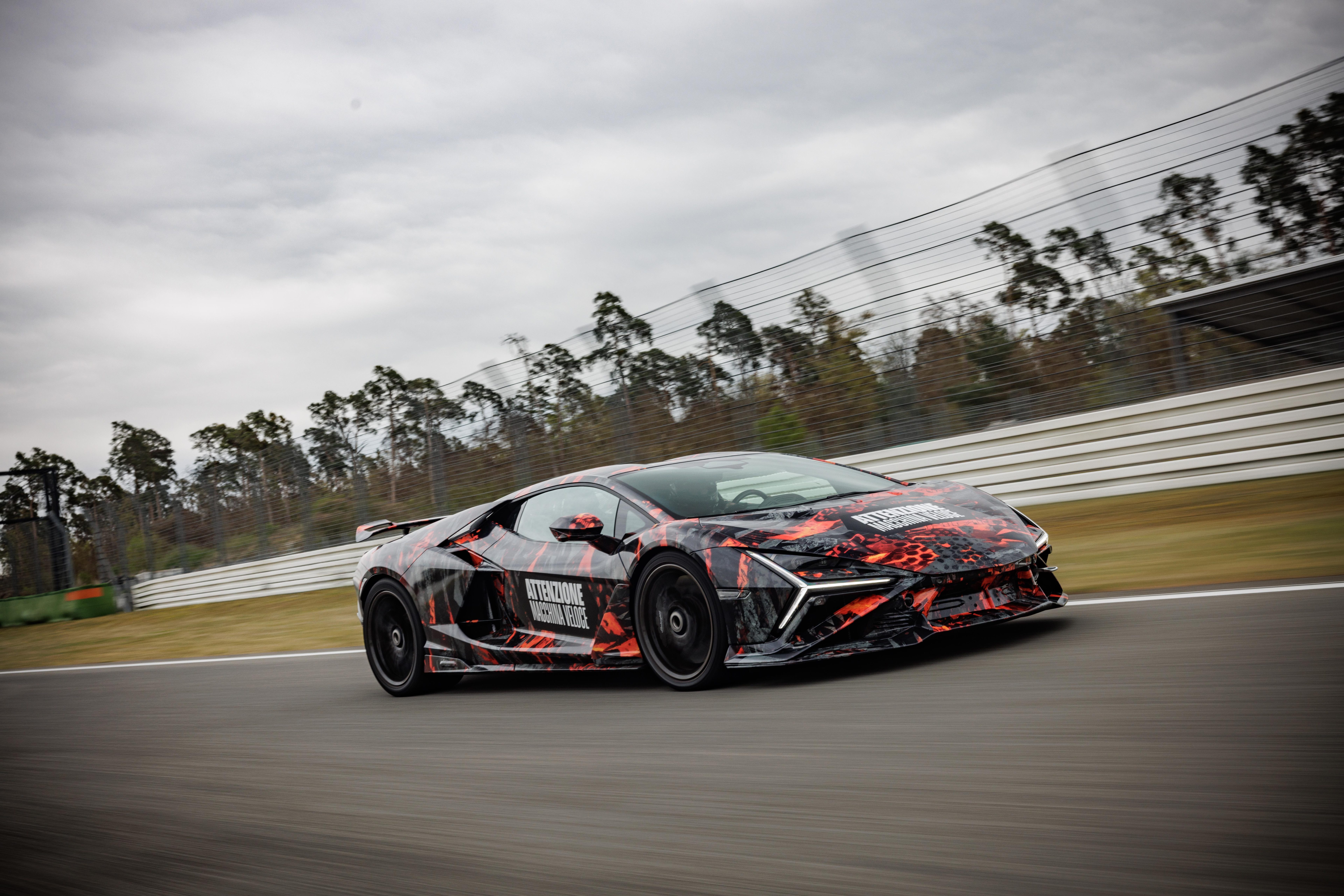 Revuelto Sv Claims Hockenheimring Production Car Record Before Anyone Even Knows Its Specs 10 Side profile of the lamborghini revuelto sv prototype at speed showing sleek lines and large rear wing