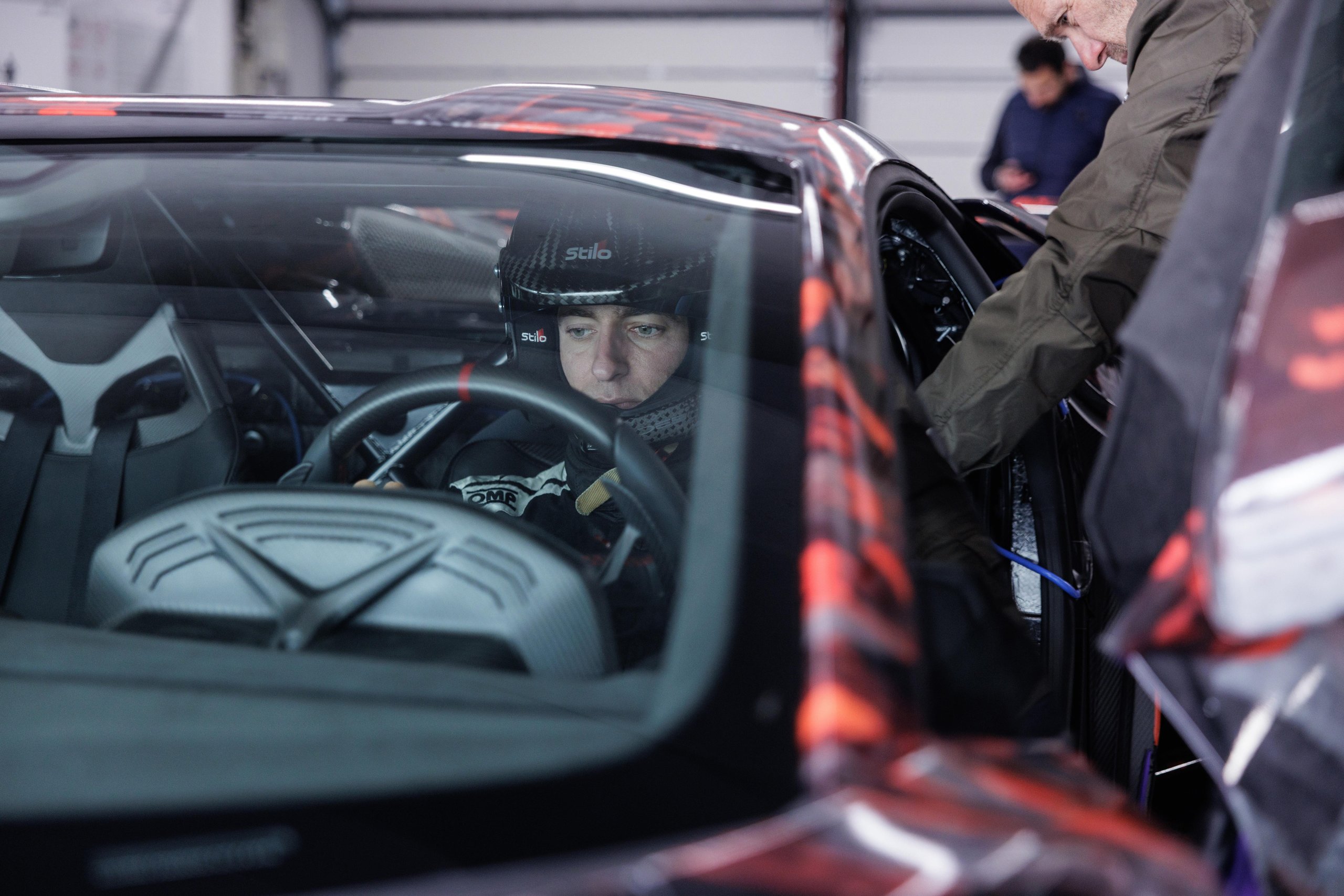 Revuelto Sv Claims Hockenheimring Production Car Record Before Anyone Even Knows Its Specs 8 Interior cockpit view of the lamborghini revuelto sv prototype with helmeted driver and carbon fiber accents